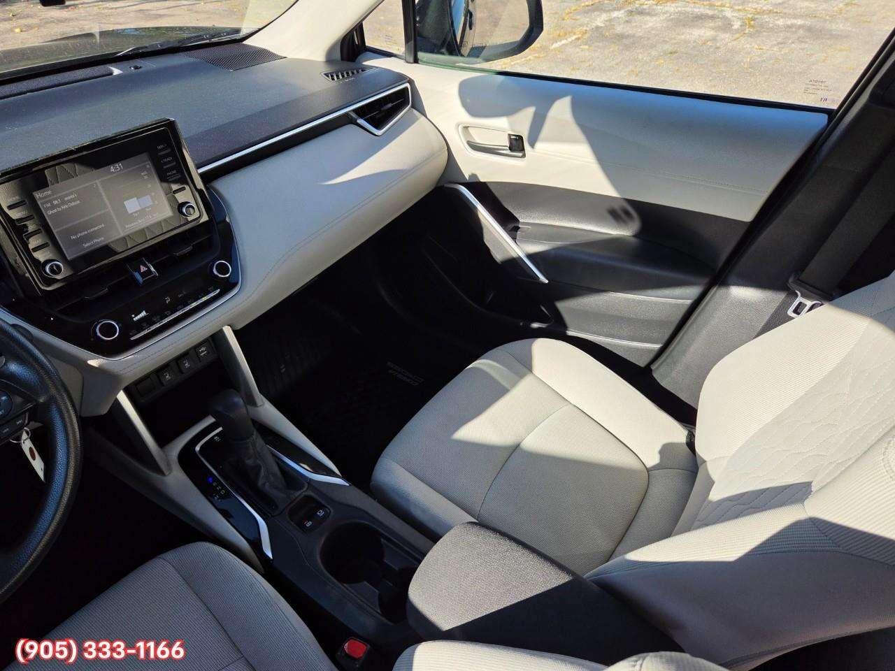 2022 Toyota Corolla Cross L Apple CarPlay & Android Auto • Heated Front Seats • Lane Assist • Keyless Entry • Backup Camera Photo