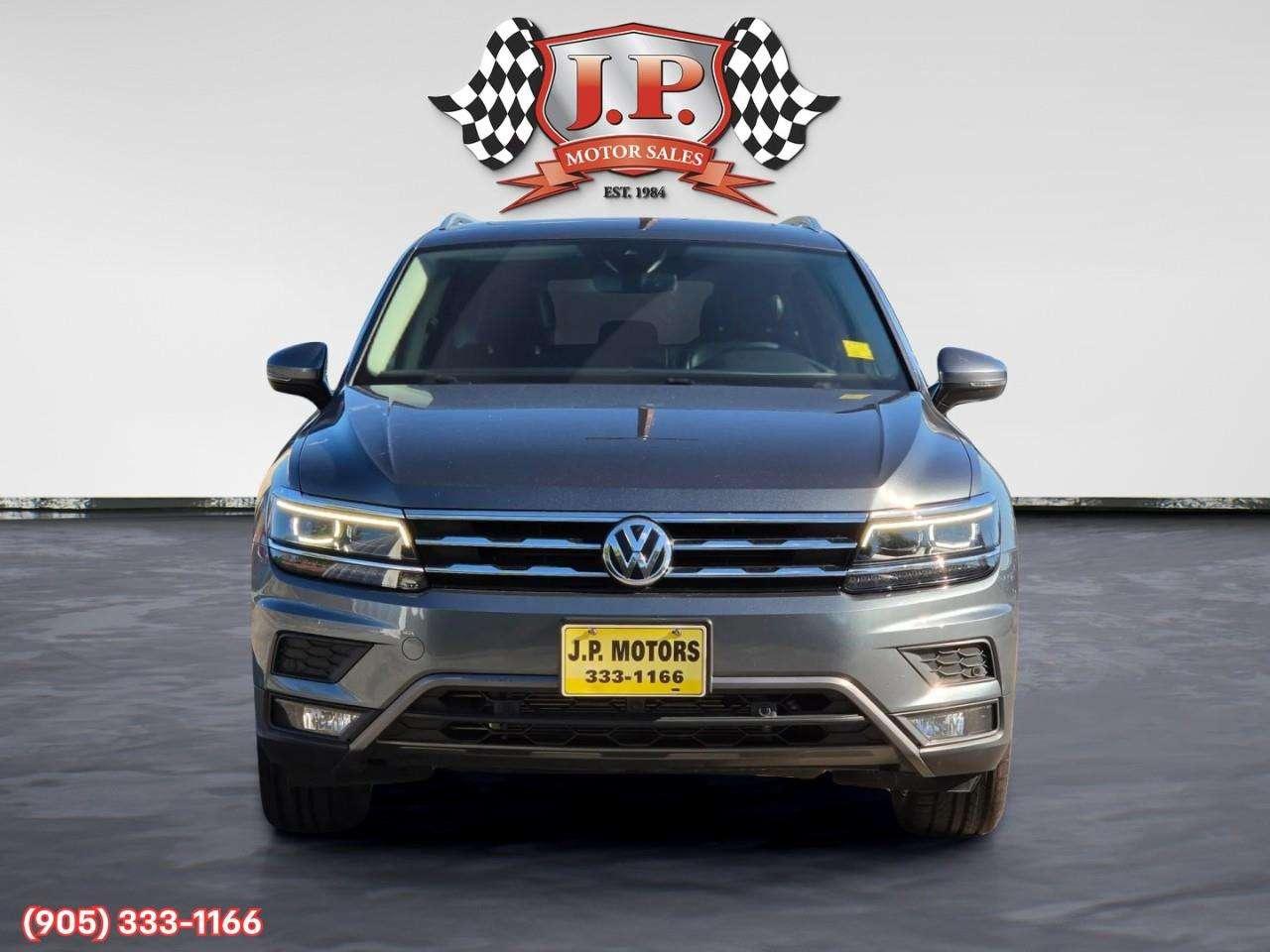 2021 Volkswagen Tiguan Highline Apple CarPlay & Android Auto • Power Sunroof • Leather Seating • Built-In Navigation System • Remote Start Syste Photo