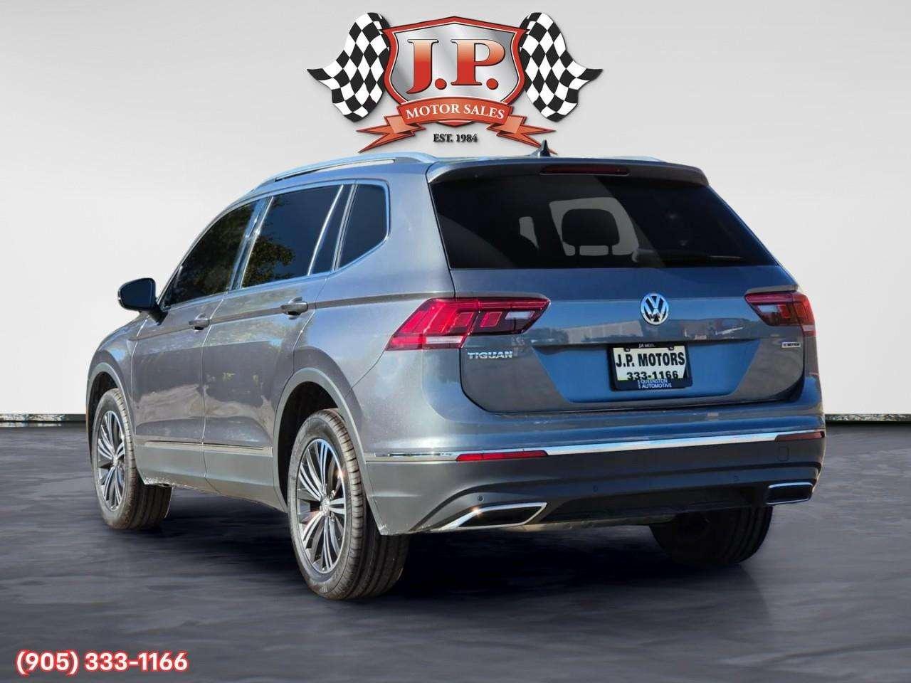 2021 Volkswagen Tiguan Highline Apple CarPlay & Android Auto • Power Sunroof • Leather Seating • Built-In Navigation System • Remote Start Syste Photo