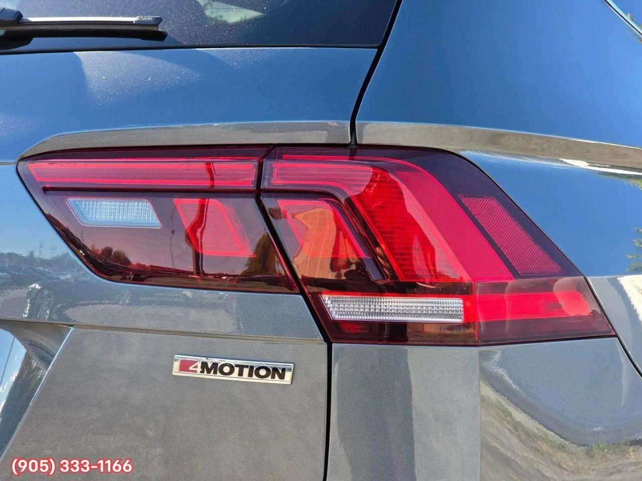 2021 Volkswagen Tiguan Highline Apple CarPlay & Android Auto • Power Sunroof • Leather Seating • Built-In Navigation System • Remote Start Syste Photo