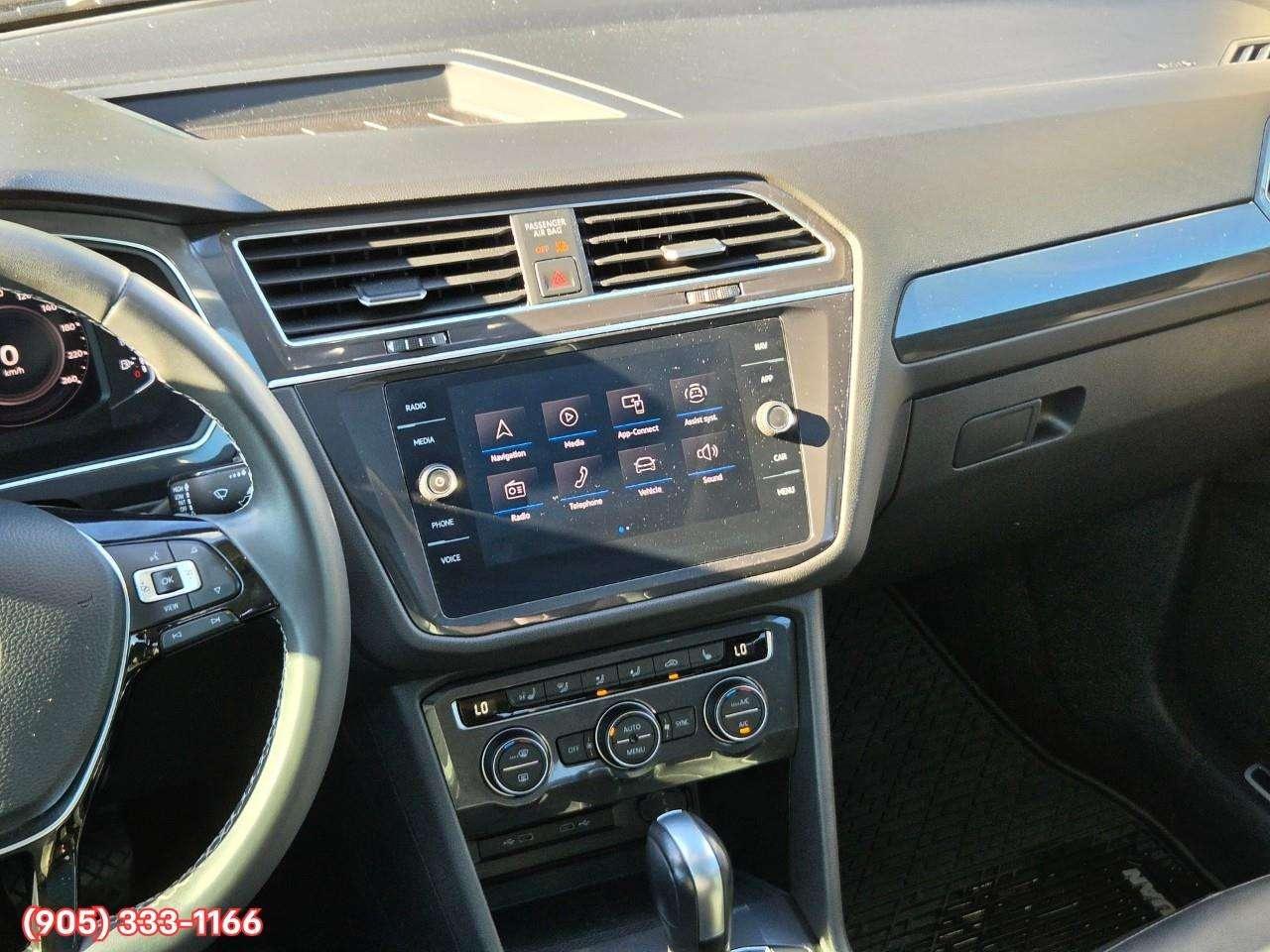2021 Volkswagen Tiguan Highline Apple CarPlay & Android Auto • Power Sunroof • Leather Seating • Built-In Navigation System • Remote Start Syste Photo