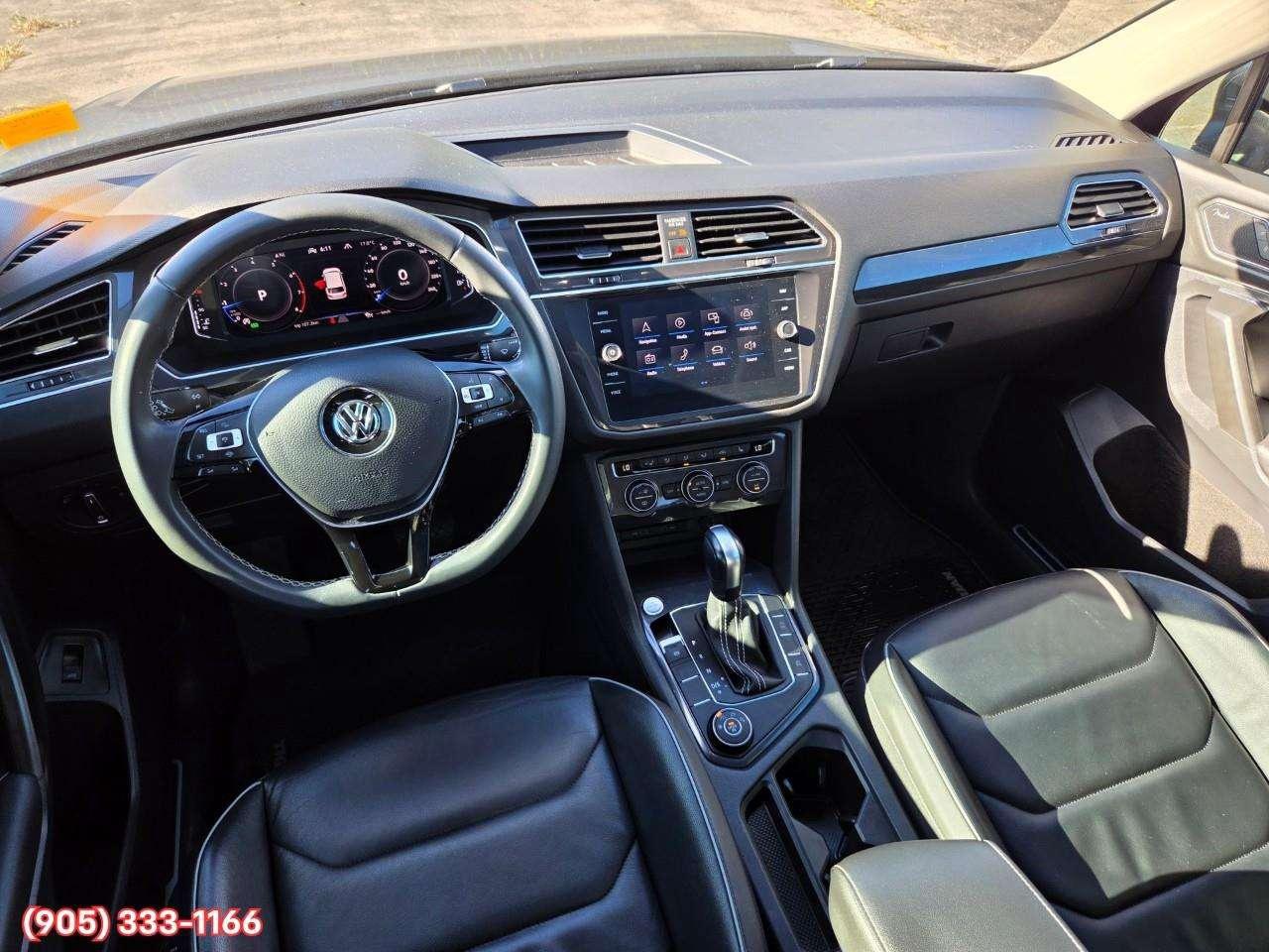 2021 Volkswagen Tiguan Highline Apple CarPlay & Android Auto • Power Sunroof • Leather Seating • Built-In Navigation System • Remote Start Syste Photo