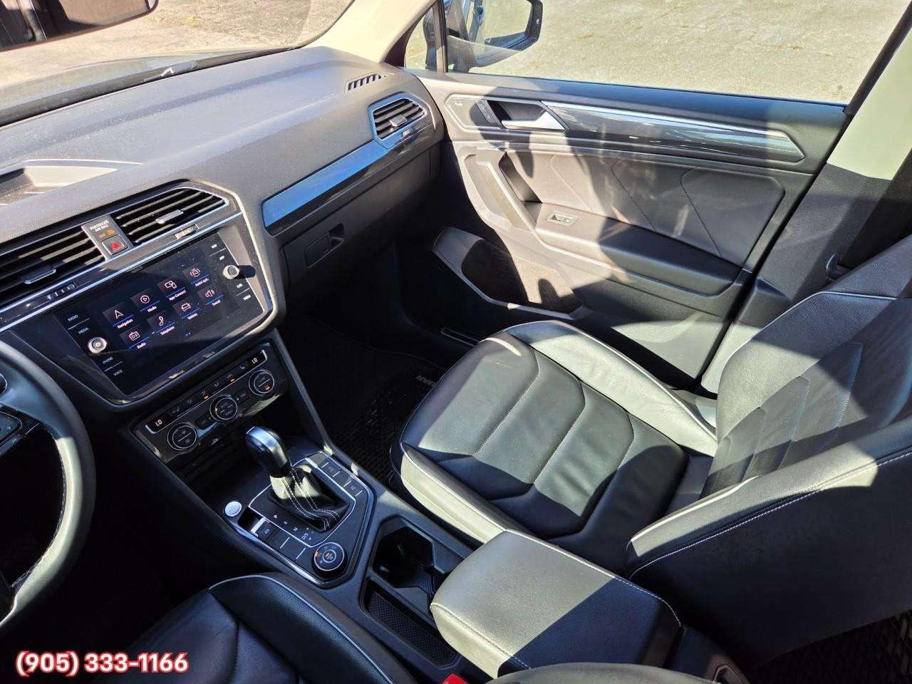 2021 Volkswagen Tiguan Highline Apple CarPlay & Android Auto • Power Sunroof • Leather Seating • Built-In Navigation System • Remote Start Syste Photo