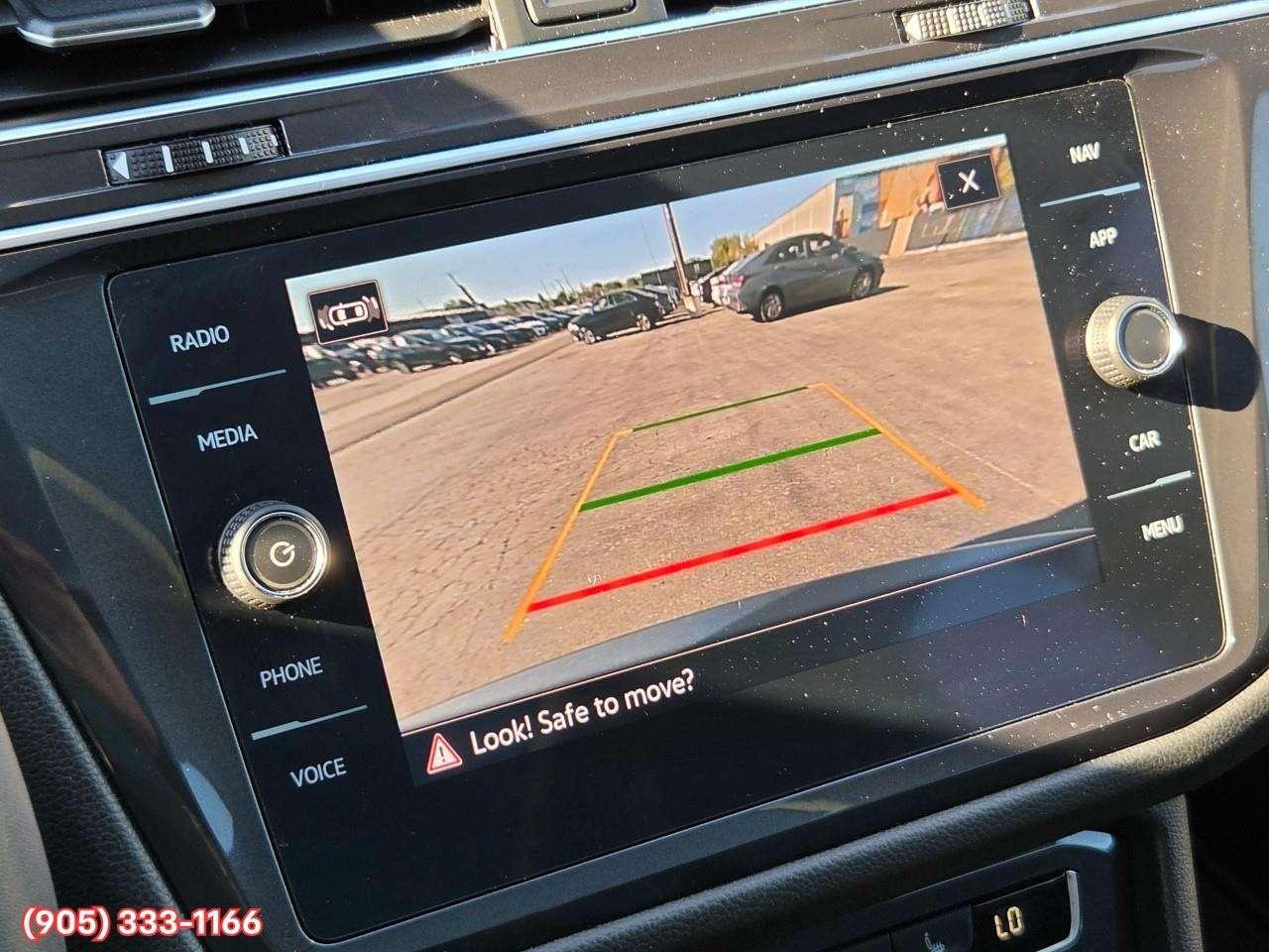 2021 Volkswagen Tiguan Highline Apple CarPlay & Android Auto • Power Sunroof • Leather Seating • Built-In Navigation System • Remote Start Syste Photo