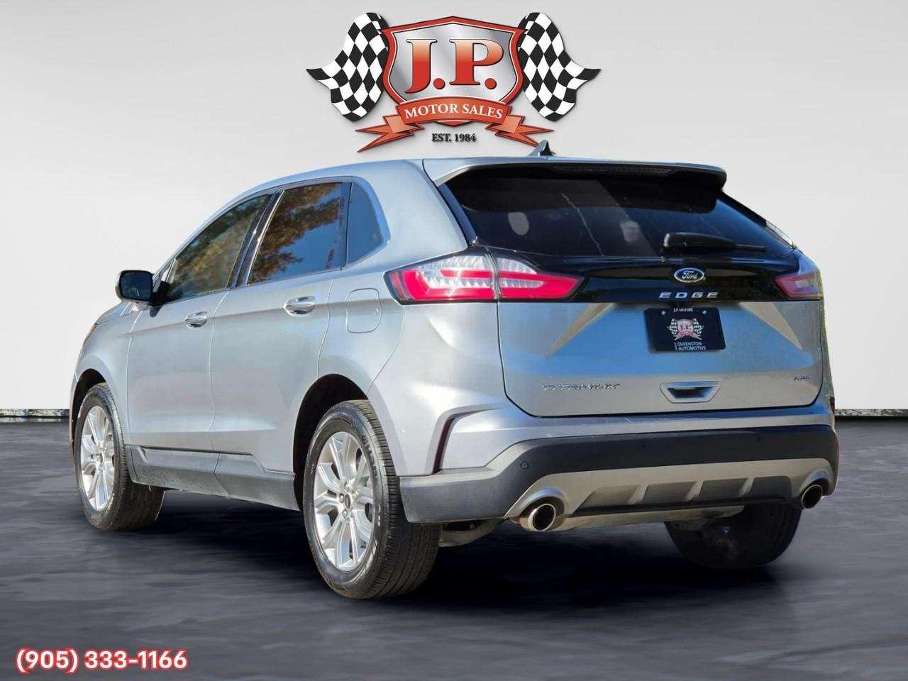 2023 Ford Edge Titanium Apple CarPlay & Android Auto • Built-In Wi-Fi Hotspot • Remote Start System • Heated Front Seats • Lane Assist • Photo
