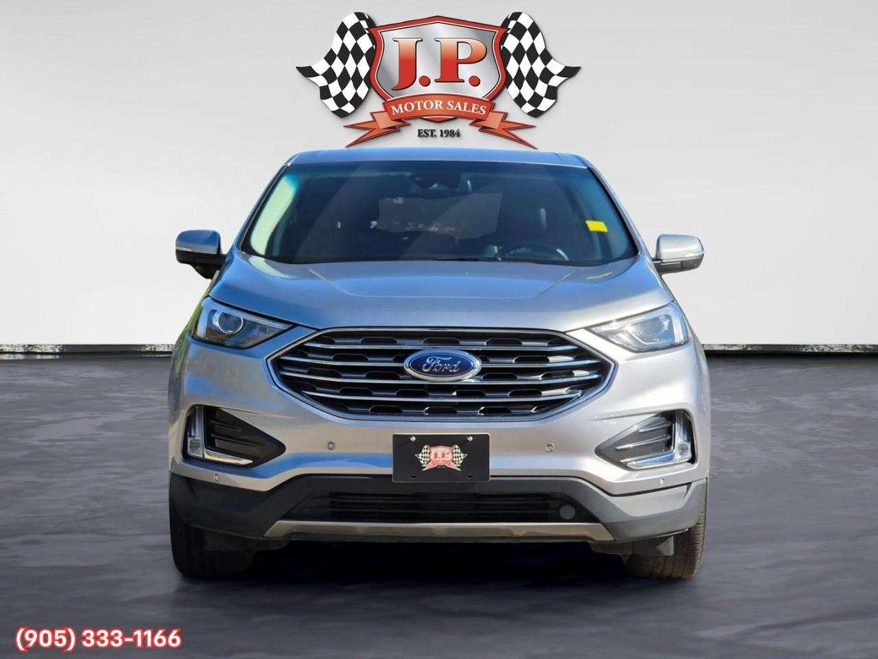 2023 Ford Edge Titanium Apple CarPlay & Android Auto • Built-In Wi-Fi Hotspot • Remote Start System • Heated Front Seats • Lane Assist • Photo