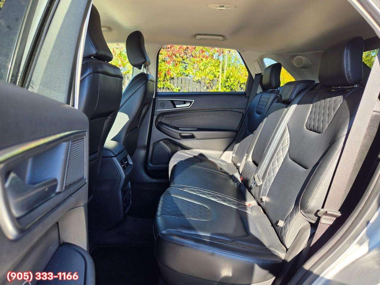 2023 Ford Edge Titanium Apple CarPlay & Android Auto • Built-In Wi-Fi Hotspot • Remote Start System • Heated Front Seats • Lane Assist • Photo