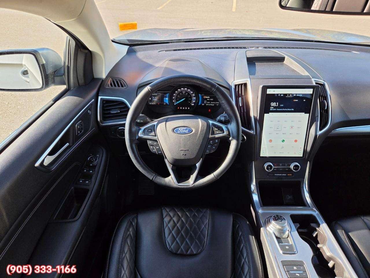2023 Ford Edge Titanium Apple CarPlay & Android Auto • Built-In Wi-Fi Hotspot • Remote Start System • Heated Front Seats • Lane Assist • Photo