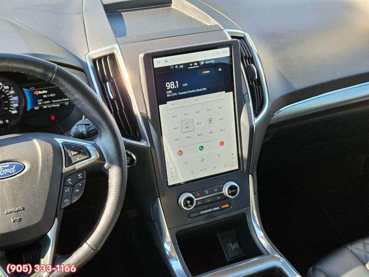 2023 Ford Edge Titanium Apple CarPlay & Android Auto • Built-In Wi-Fi Hotspot • Remote Start System • Heated Front Seats • Lane Assist • Photo