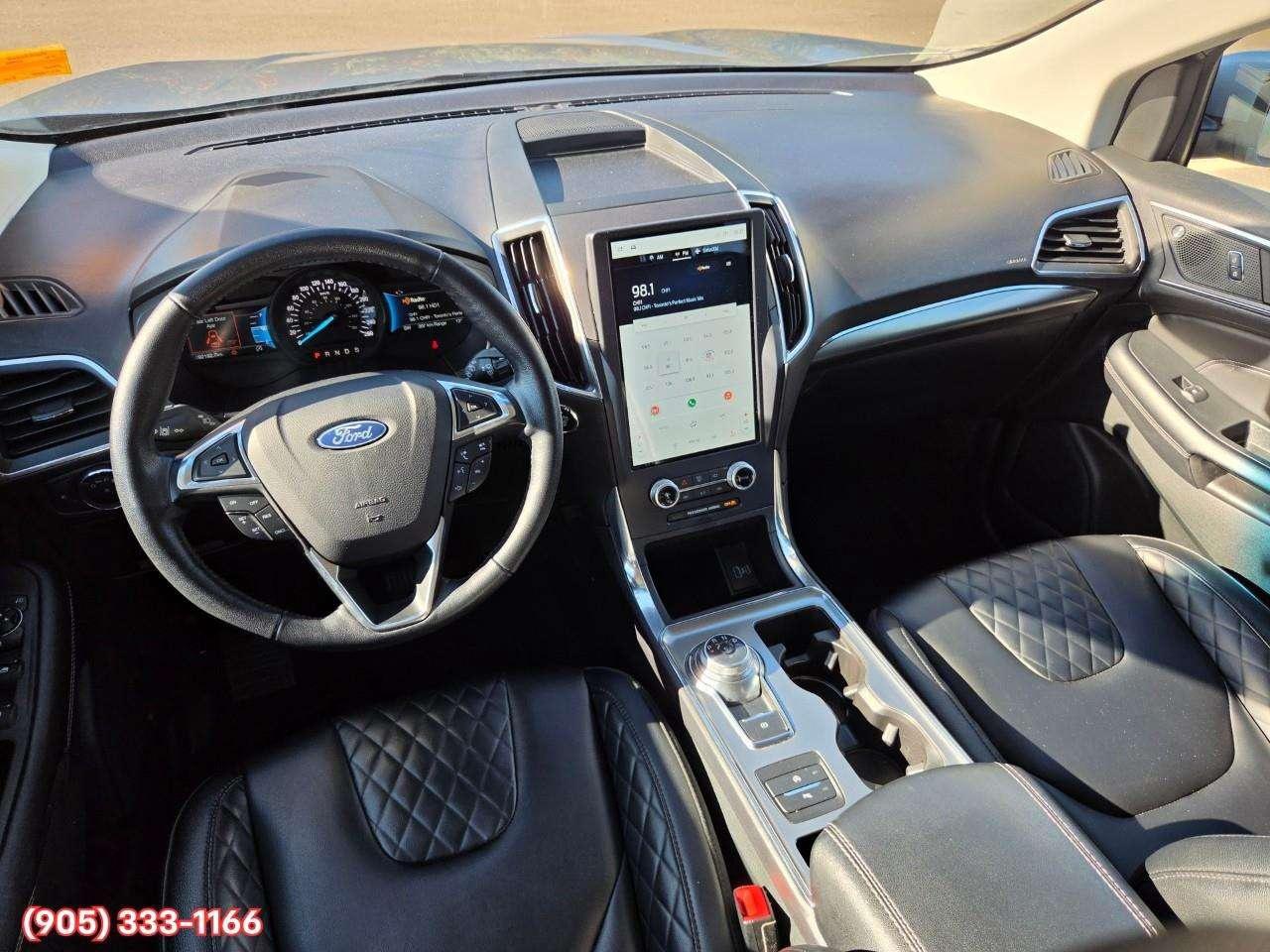 2023 Ford Edge Titanium Apple CarPlay & Android Auto • Built-In Wi-Fi Hotspot • Remote Start System • Heated Front Seats • Lane Assist • Photo