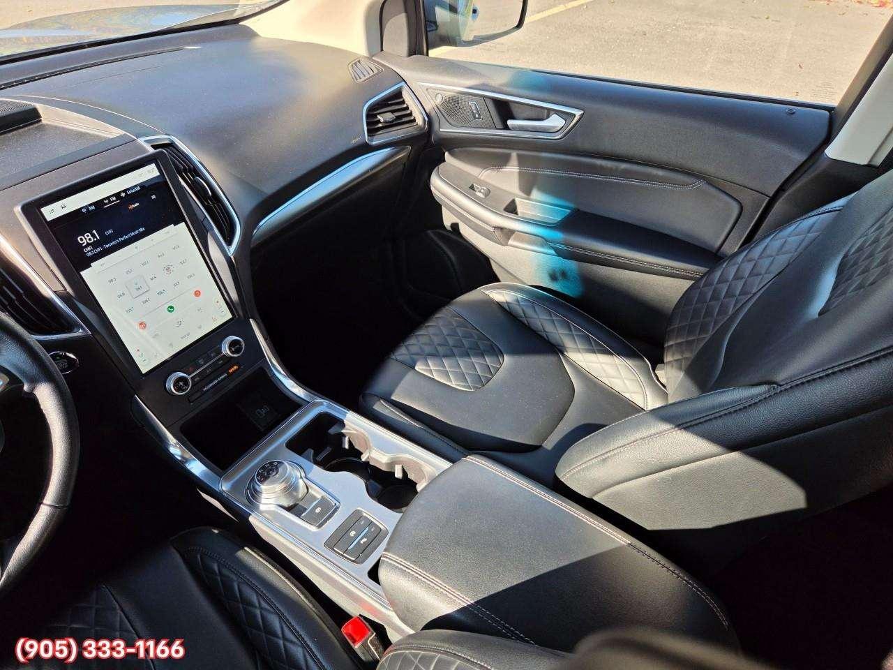 2023 Ford Edge Titanium Apple CarPlay & Android Auto • Built-In Wi-Fi Hotspot • Remote Start System • Heated Front Seats • Lane Assist • Photo