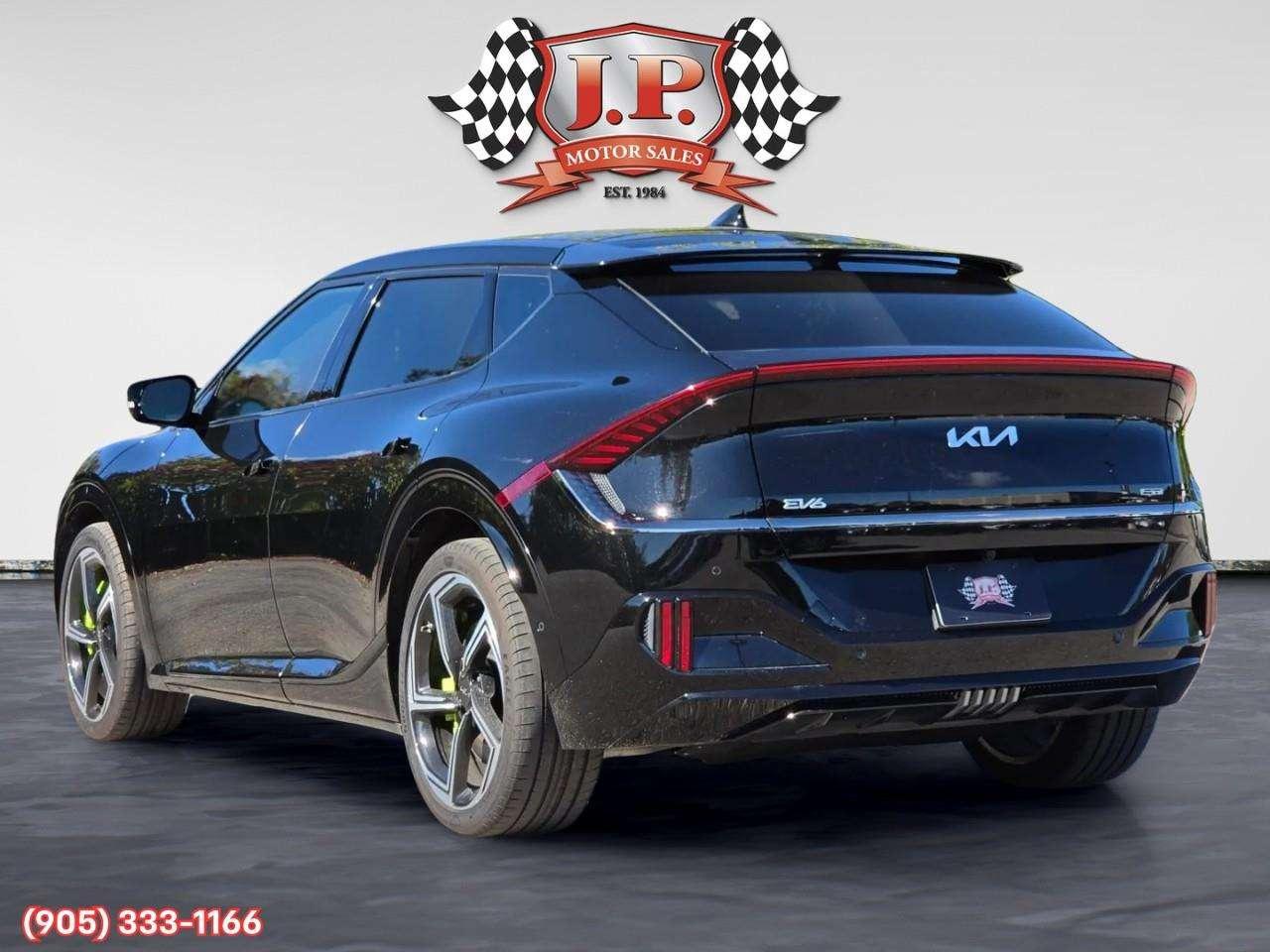 2023 Kia EV6 GT Apple CarPlay & Android Auto • Heads-Up Display • Automatic Parking Assist • Power Sunroof • Built-In Navigation Syste Photo4