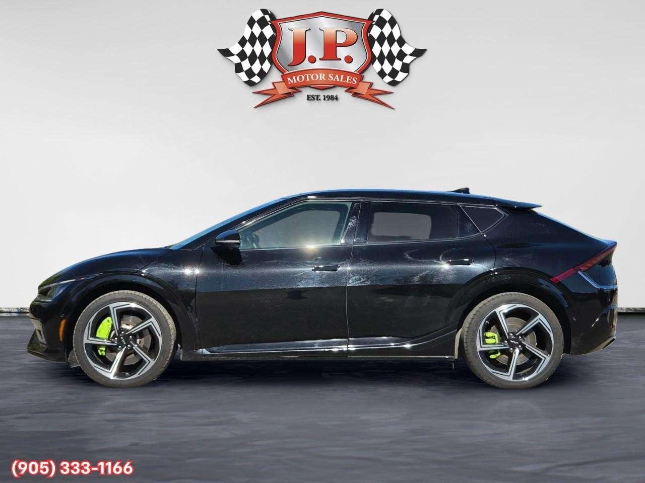 2023 Kia EV6 GT Apple CarPlay & Android Auto • Heads-Up Display • Automatic Parking Assist • Power Sunroof • Built-In Navigation Syste Photo