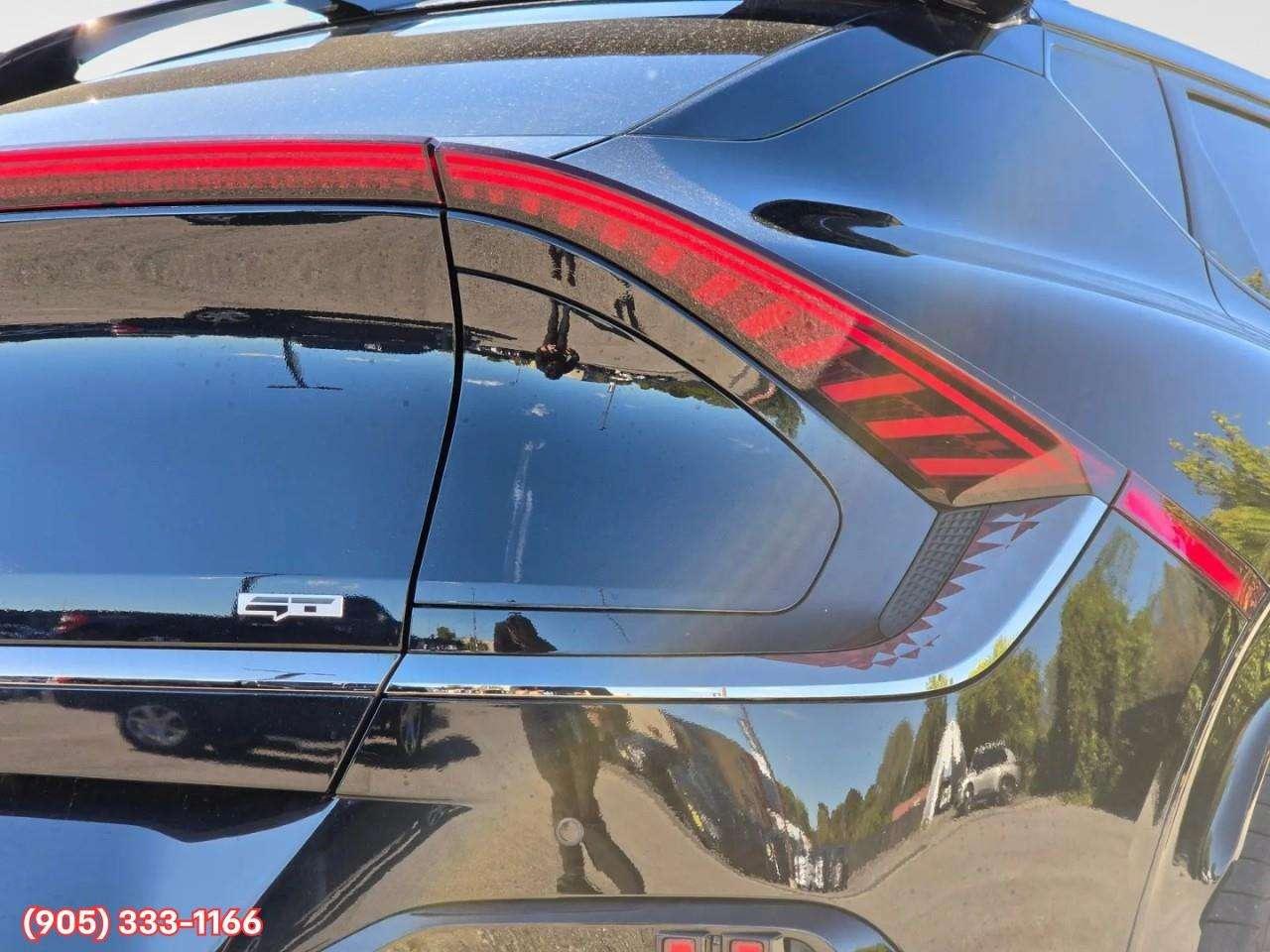 2023 Kia EV6 GT Apple CarPlay & Android Auto • Heads-Up Display • Automatic Parking Assist • Power Sunroof • Built-In Navigation Syste Photo