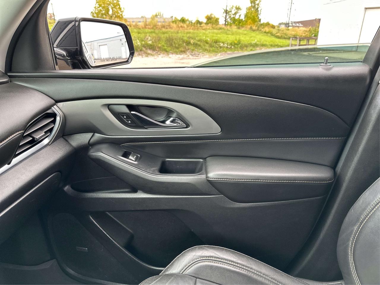 2018 Chevrolet Traverse 1LT/AWD/7PASS/HEATED/BUPCAM/WE FINANCE ALL CREDIT! Photo