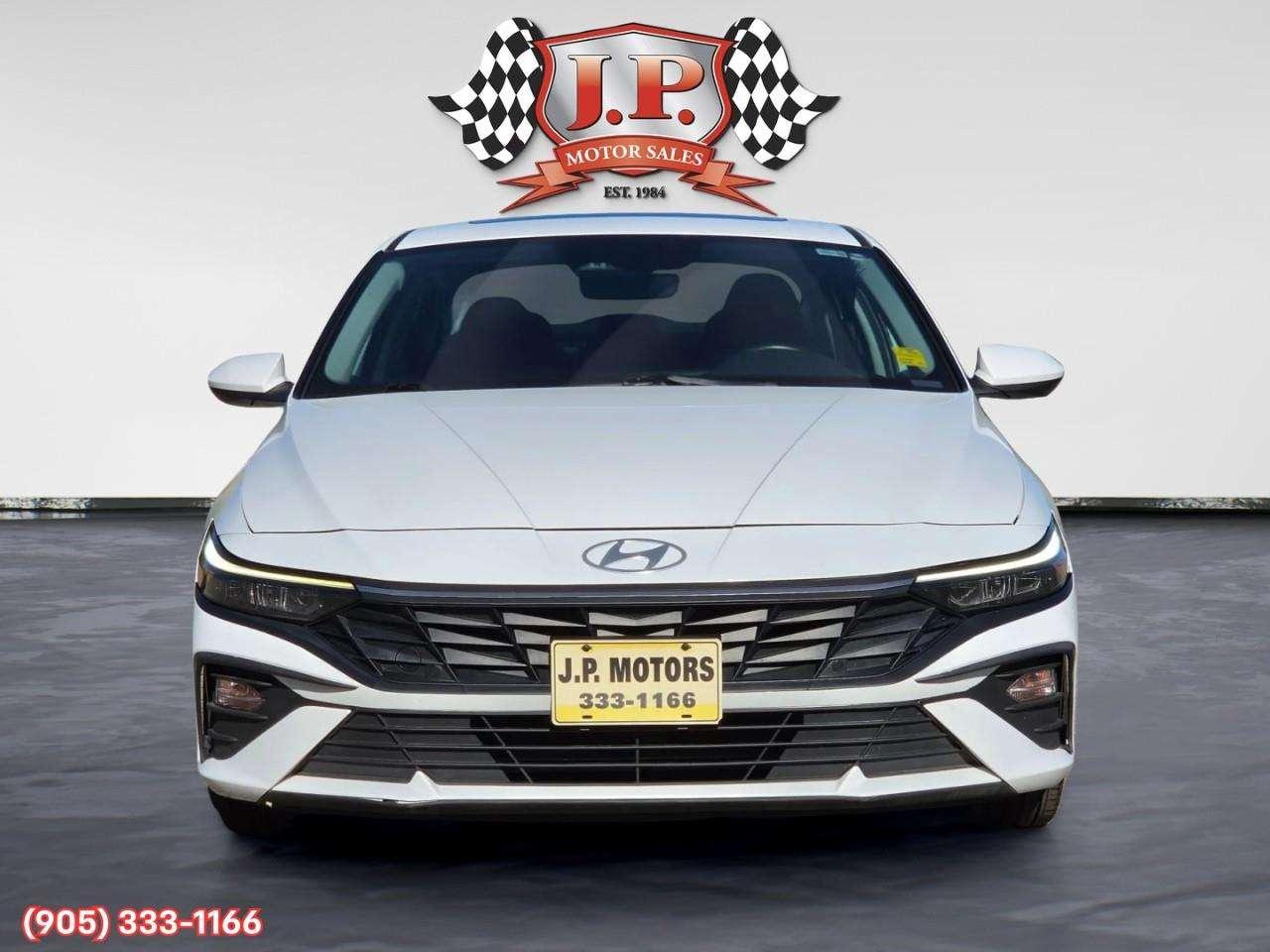 2024 Hyundai Elantra Preferred w/Tech Package Apple CarPlay & Android Auto • Power Sunroof • Built-In Navigation System • Remote Start System Photo