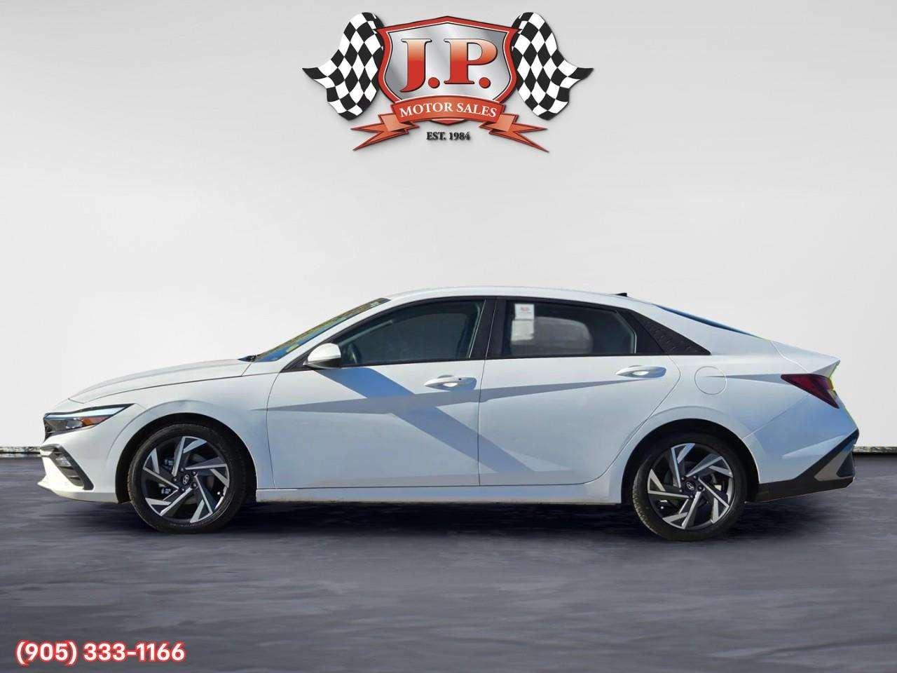 2024 Hyundai Elantra Preferred w/Tech Package Apple CarPlay & Android Auto • Power Sunroof • Built-In Navigation System • Remote Start System Photo