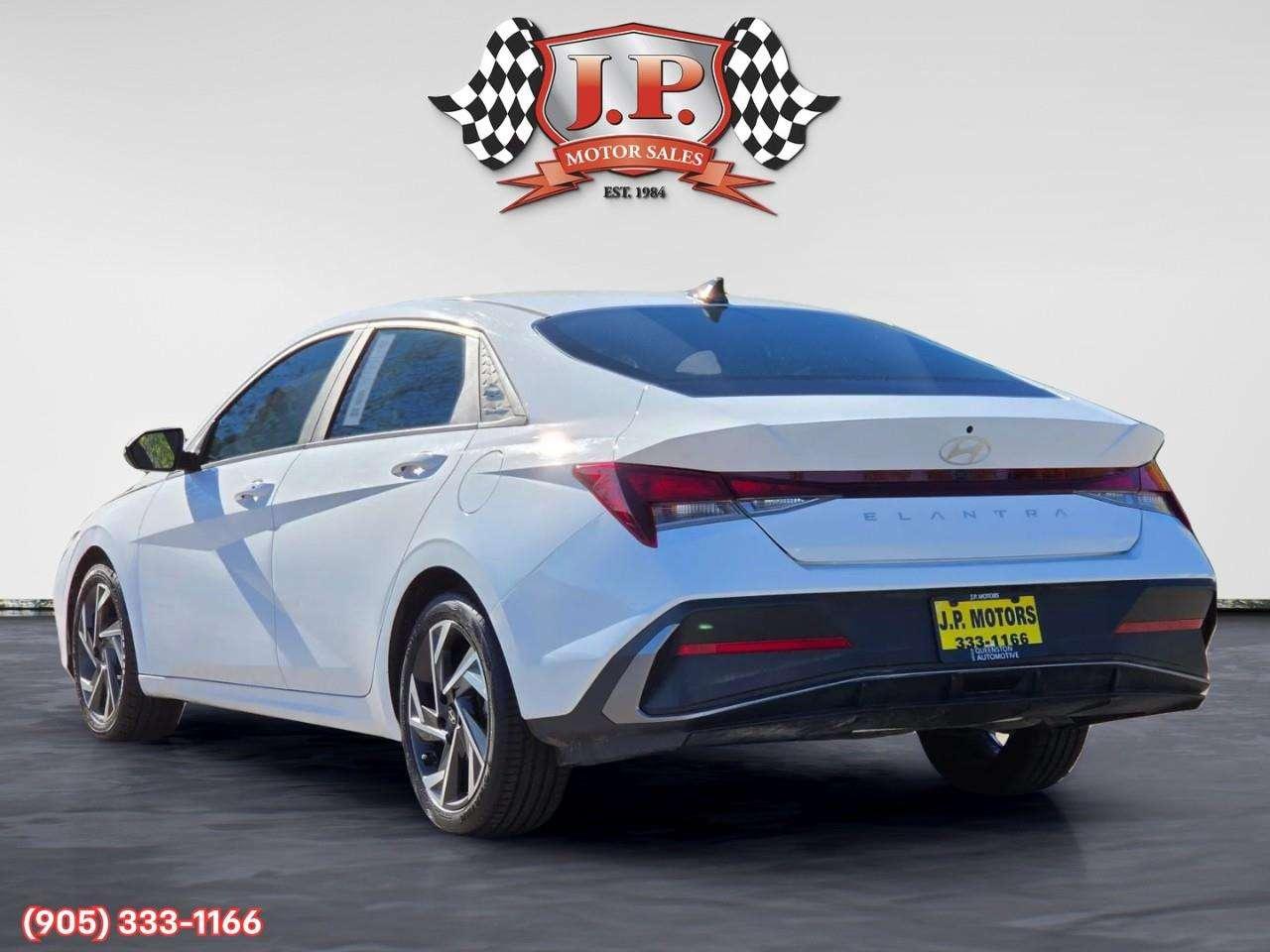 2024 Hyundai Elantra Preferred w/Tech Package Apple CarPlay & Android Auto • Power Sunroof • Built-In Navigation System • Remote Start System Photo