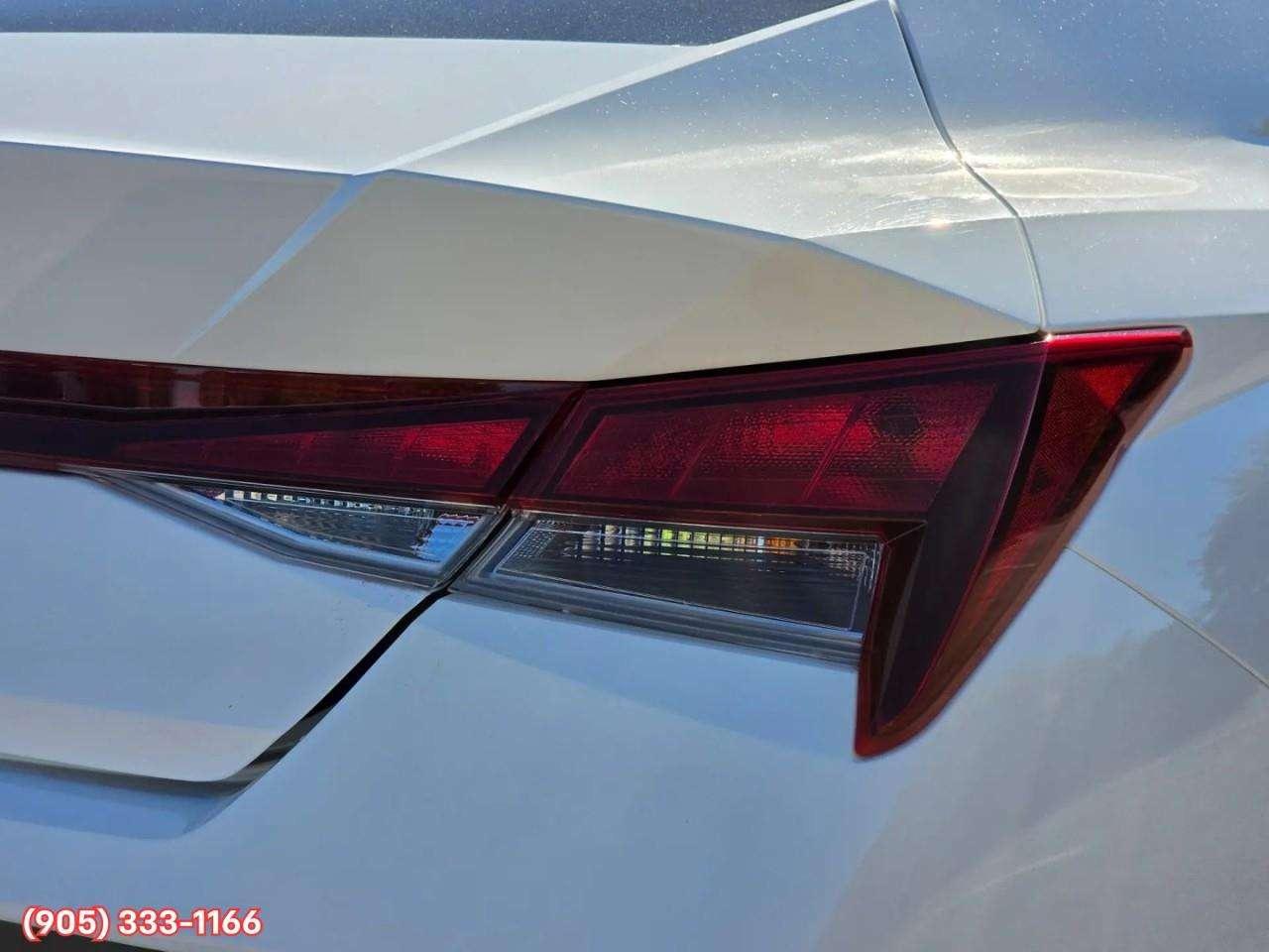 2024 Hyundai Elantra Preferred w/Tech Package Apple CarPlay & Android Auto • Power Sunroof • Built-In Navigation System • Remote Start System Photo