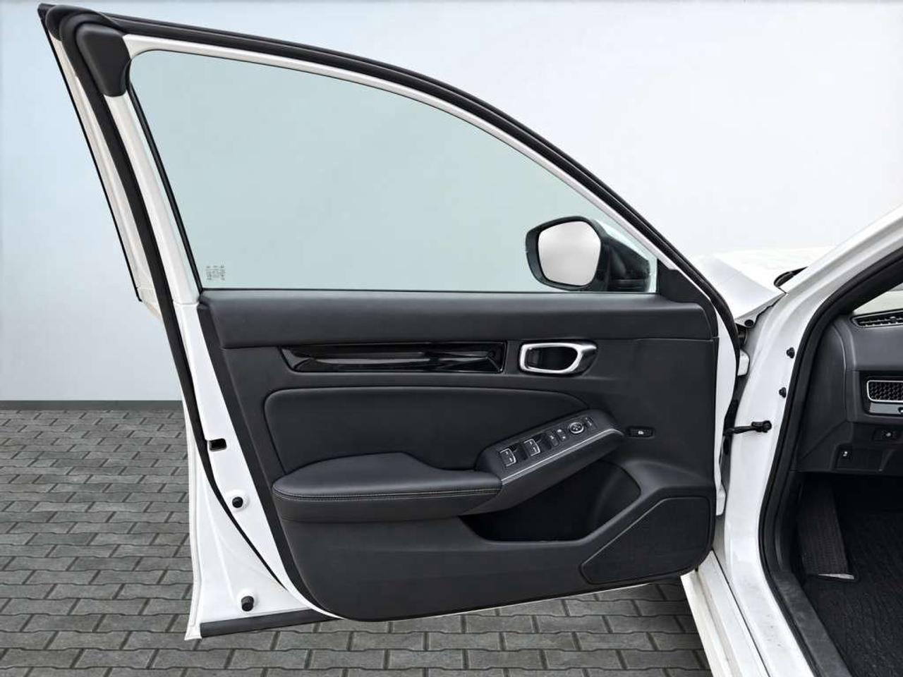 2025 Honda Civic Sport Touring Hybrid   Leather   Sunroof   Carplay  NAVI/ LANE KEEP ASSIST/  Wireless charging Photo