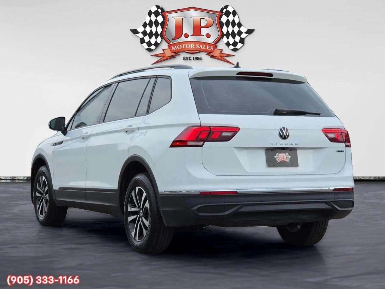 2023 Volkswagen Tiguan Trendline Apple CarPlay & Android Auto • Heated Front Seats • Keyless Entry • Alloy Wheels • Backup Camera Photo