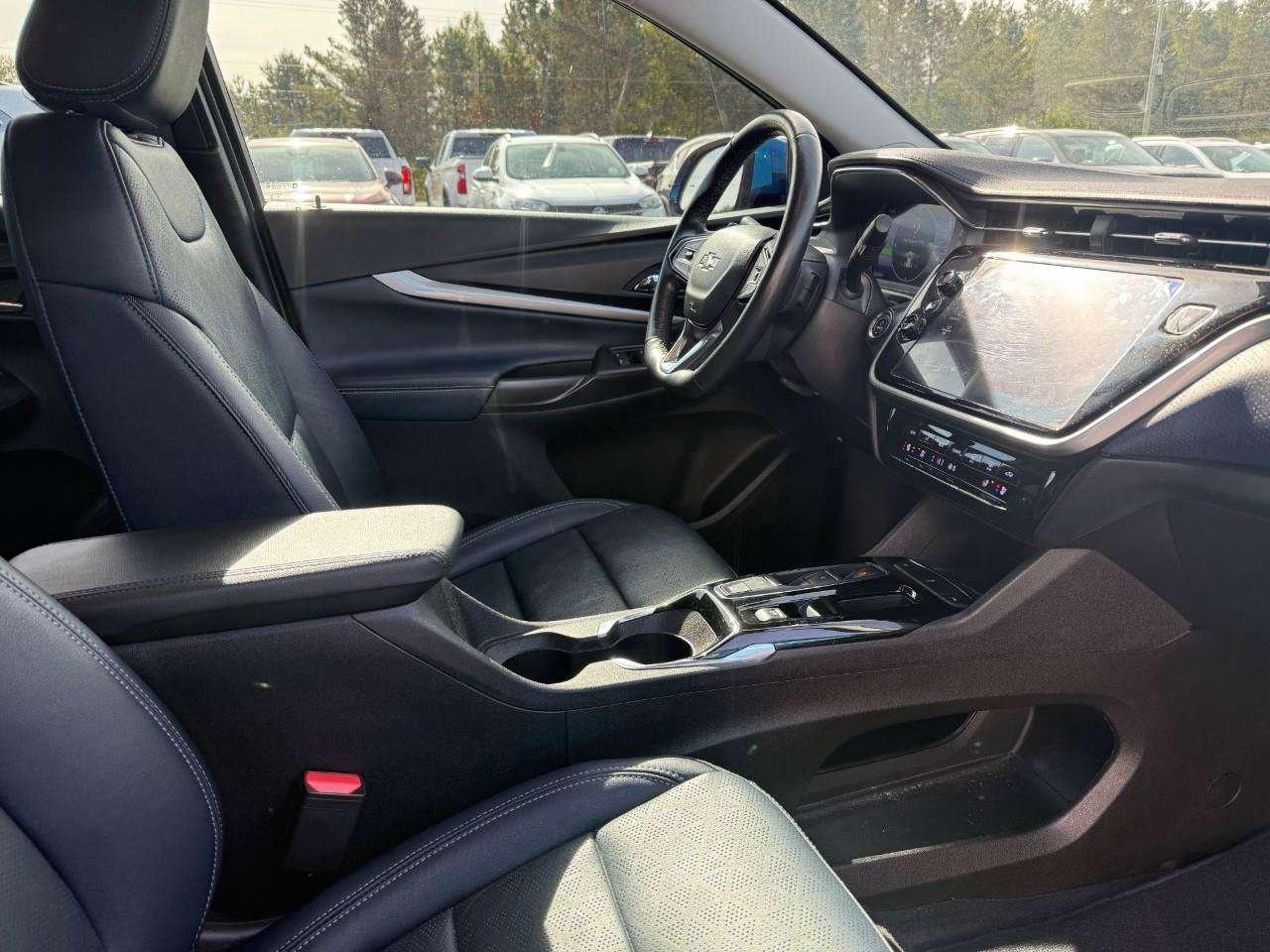 2023 Chevrolet Bolt REAR CARGO STORAGE, DOUBLE FLOOR. WIRELESS CHARGING. REAR PARK ASSIST. HEATED SEATS & STEERING WHEEL. DC FAST CHARGING. Photo