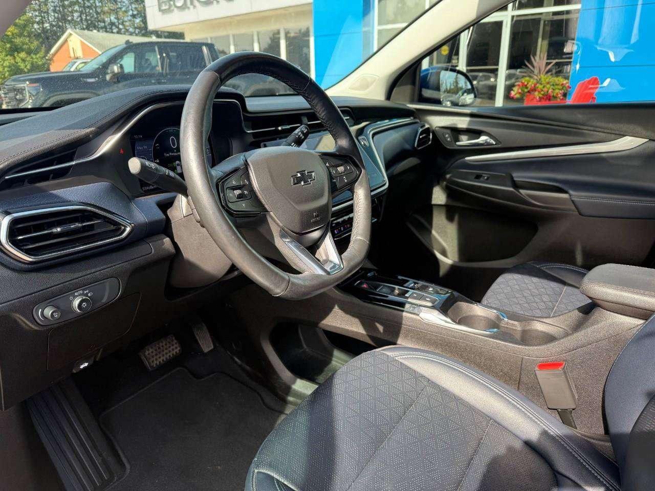 2023 Chevrolet Bolt REAR CARGO STORAGE, DOUBLE FLOOR. WIRELESS CHARGING. REAR PARK ASSIST. HEATED SEATS & STEERING WHEEL. DC FAST CHARGING. Photo