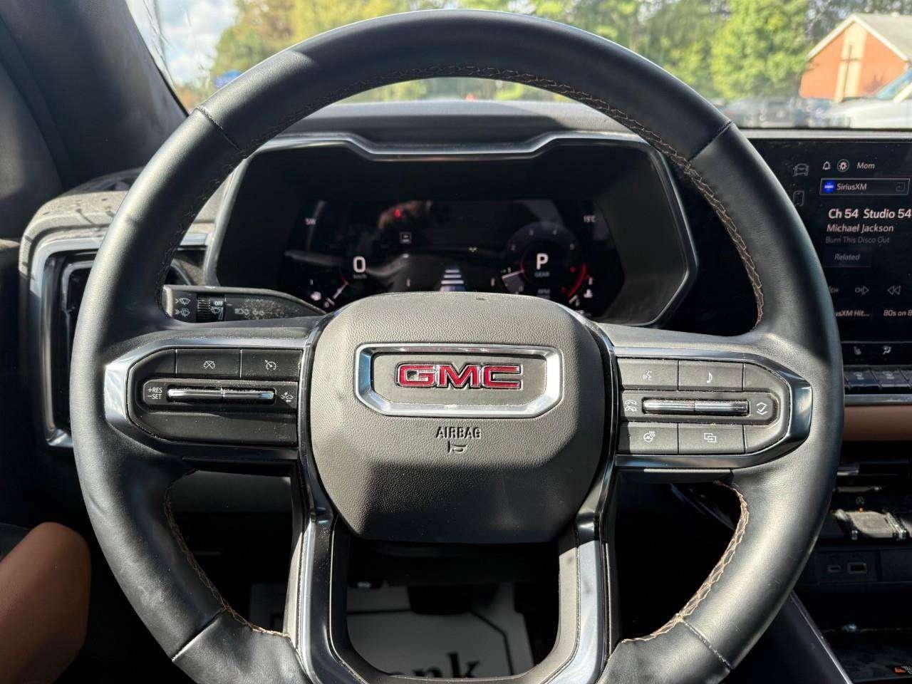2024 GMC Canyon AT4 PREMIUM PKG. PROGRADE TRAILERING PKG. TECH PLUS PKG. RUNNING BOARDS. TONNEAU. Photo