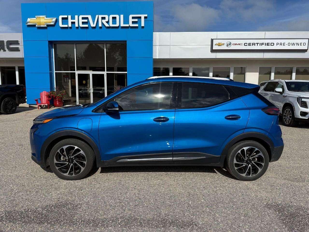 2023 Chevrolet Bolt REAR CARGO STORAGE, DOUBLE FLOOR. WIRELESS CHARGING. REAR PARK ASSIST. HEATED SEATS & STEERING WHEEL. DC FAST CHARGING. Photo