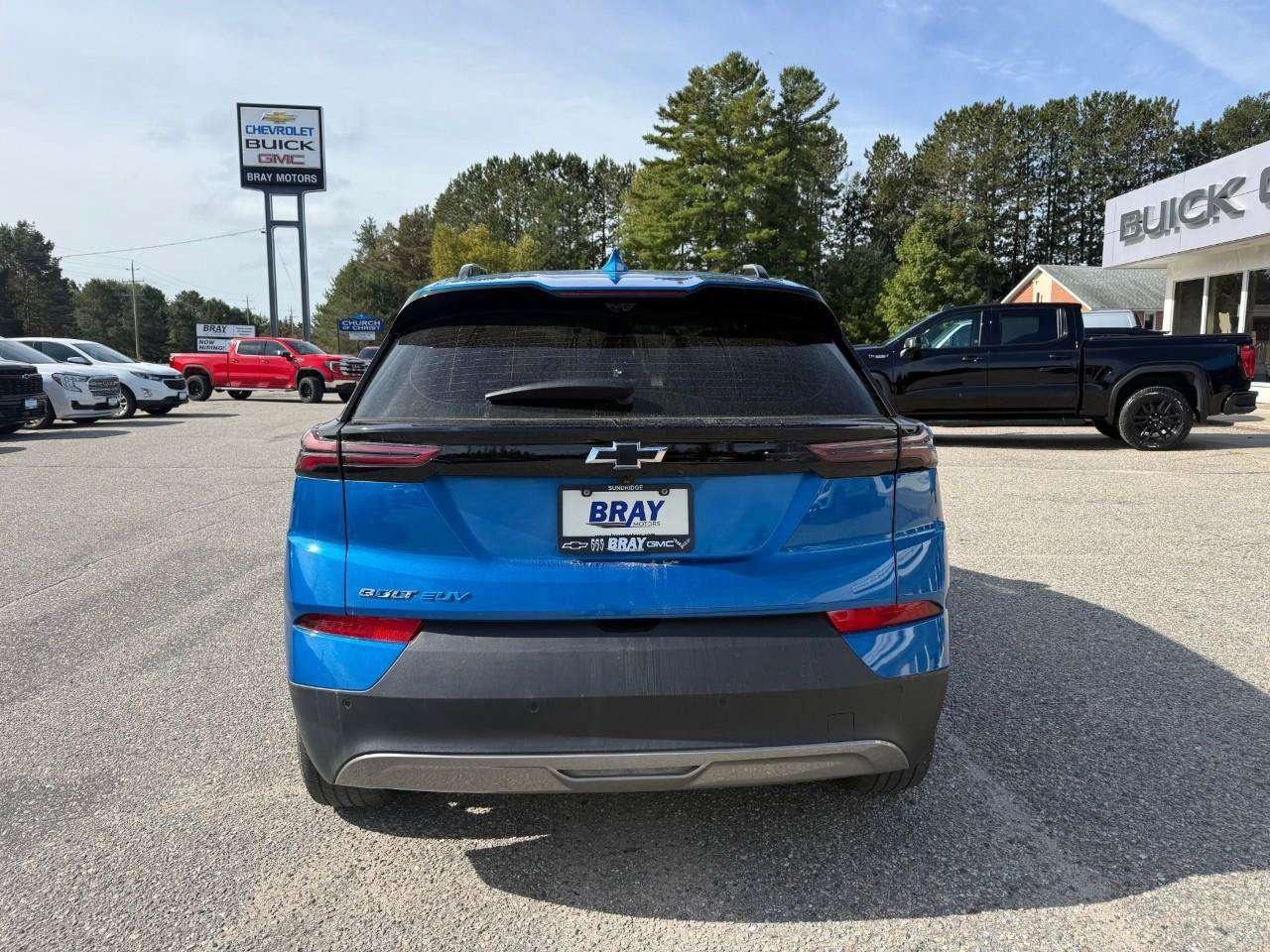 2023 Chevrolet Bolt REAR CARGO STORAGE, DOUBLE FLOOR. WIRELESS CHARGING. REAR PARK ASSIST. HEATED SEATS & STEERING WHEEL. DC FAST CHARGING. Photo