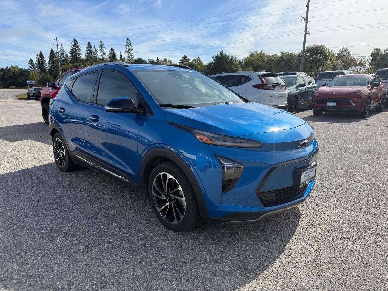 2023 Chevrolet Bolt REAR CARGO STORAGE, DOUBLE FLOOR. WIRELESS CHARGING. REAR PARK ASSIST. HEATED SEATS & STEERING WHEEL. DC FAST CHARGING. Photo