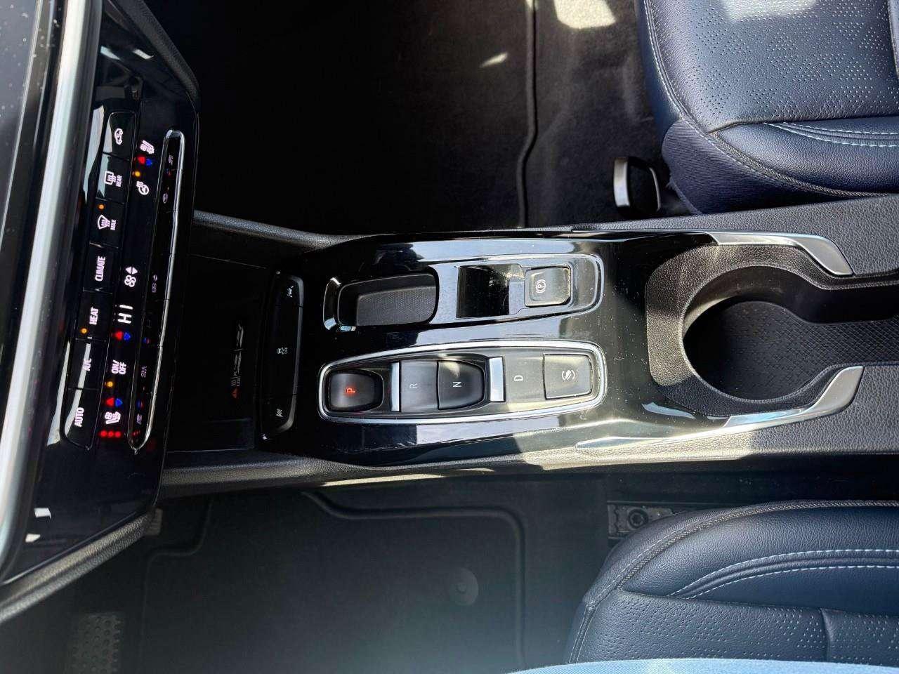 2023 Chevrolet Bolt REAR CARGO STORAGE, DOUBLE FLOOR. WIRELESS CHARGING. REAR PARK ASSIST. HEATED SEATS & STEERING WHEEL. DC FAST CHARGING. Photo