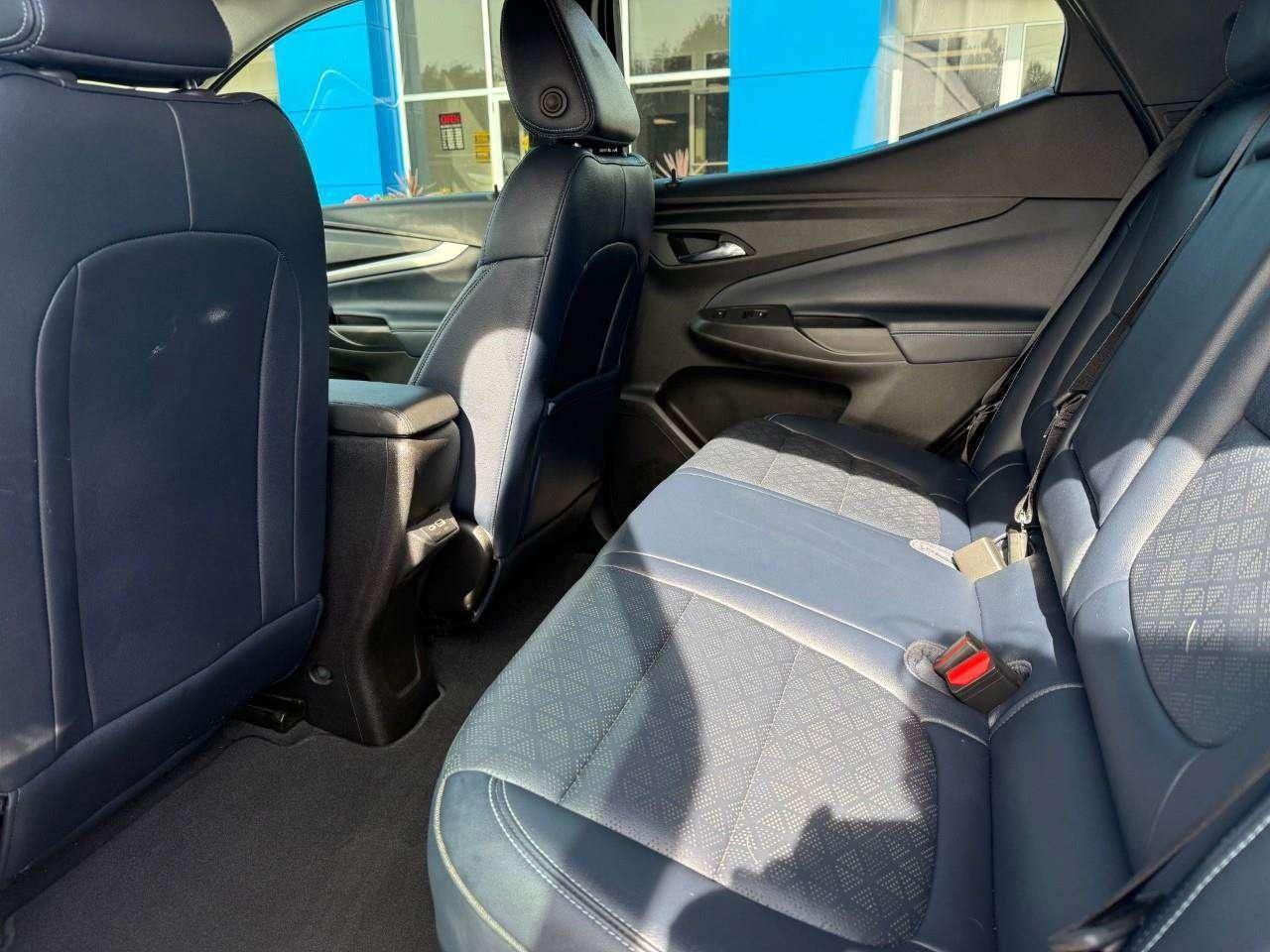 2023 Chevrolet Bolt REAR CARGO STORAGE, DOUBLE FLOOR. WIRELESS CHARGING. REAR PARK ASSIST. HEATED SEATS & STEERING WHEEL. DC FAST CHARGING. Photo