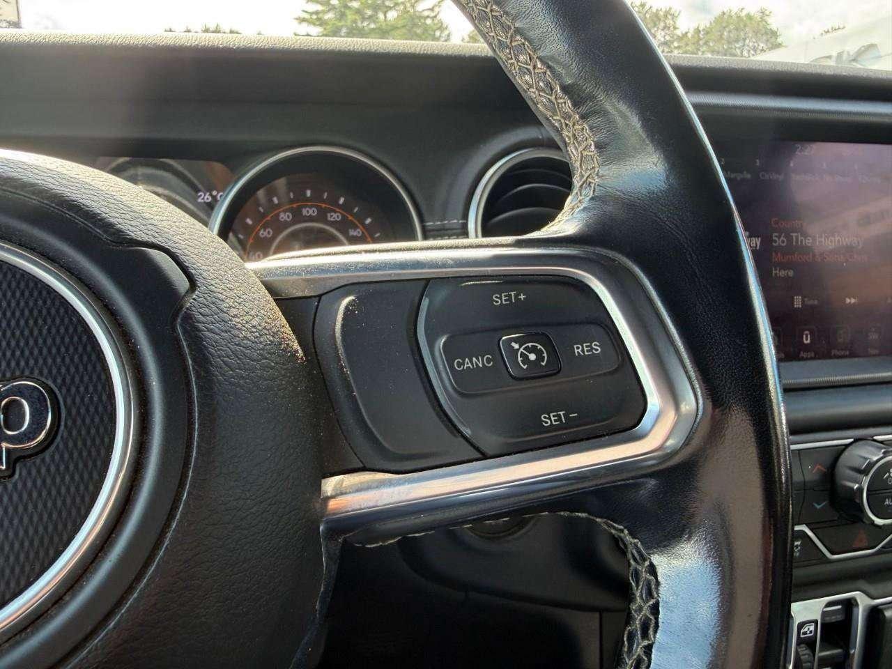 2021 Jeep Wrangler REMOVALE TOP. ALPINE SOUND SYSTEM. SUNRIDER SOFT TOP. HEATED FRONT SEATS. CERTIFIED. Photo