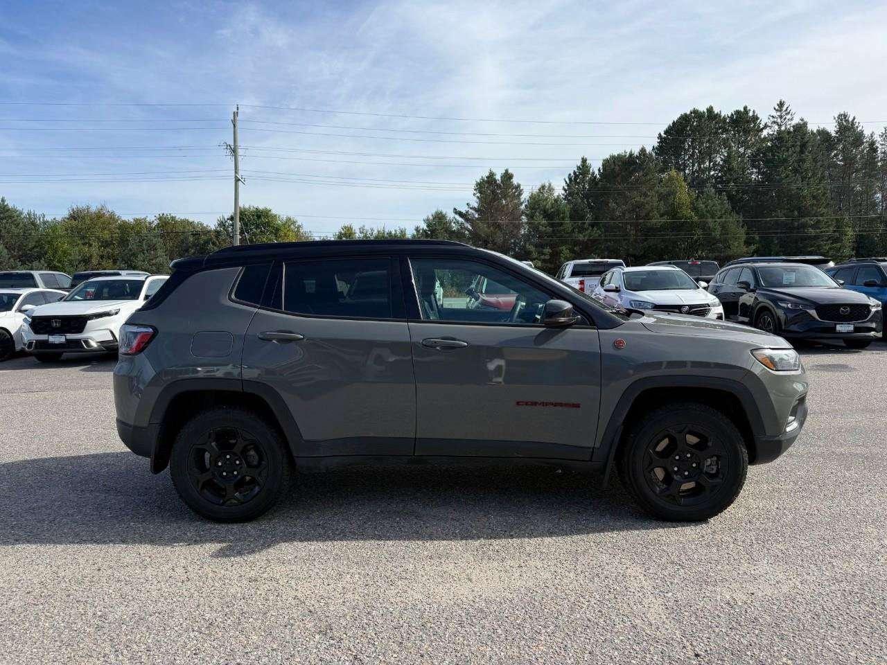 2023 Jeep Compass SELECT TERRAIN TRACTION. RAIN SENSING WIPERS. DROWSY DRIVER ALERT. 10' INCH DISPLAY. ALL WEATHER MATS. CERTIFIED. Photo