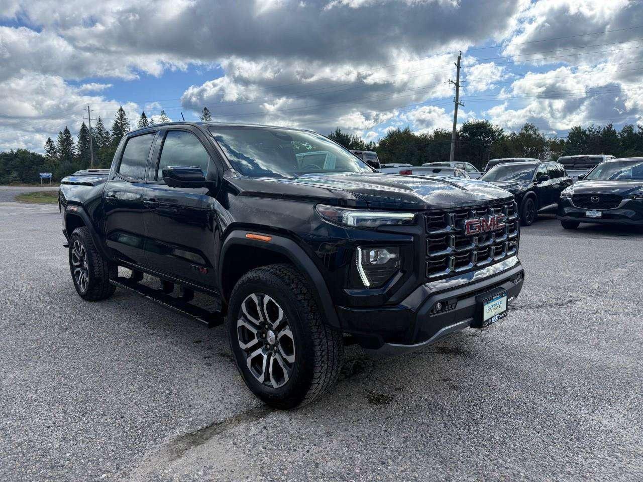 2024 GMC Canyon AT4 PREMIUM PKG. PROGRADE TRAILERING PKG. TECH PLUS PKG. RUNNING BOARDS. TONNEAU. Photo