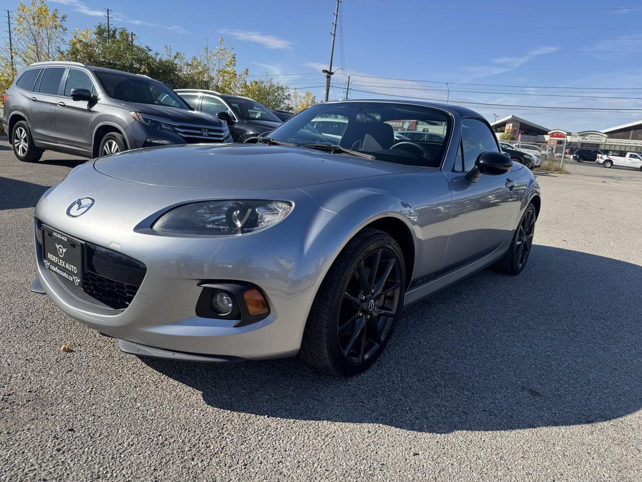 Silver 2013 Mazda MX-5 Miata Convertible Rear-Wheel Drive Manual