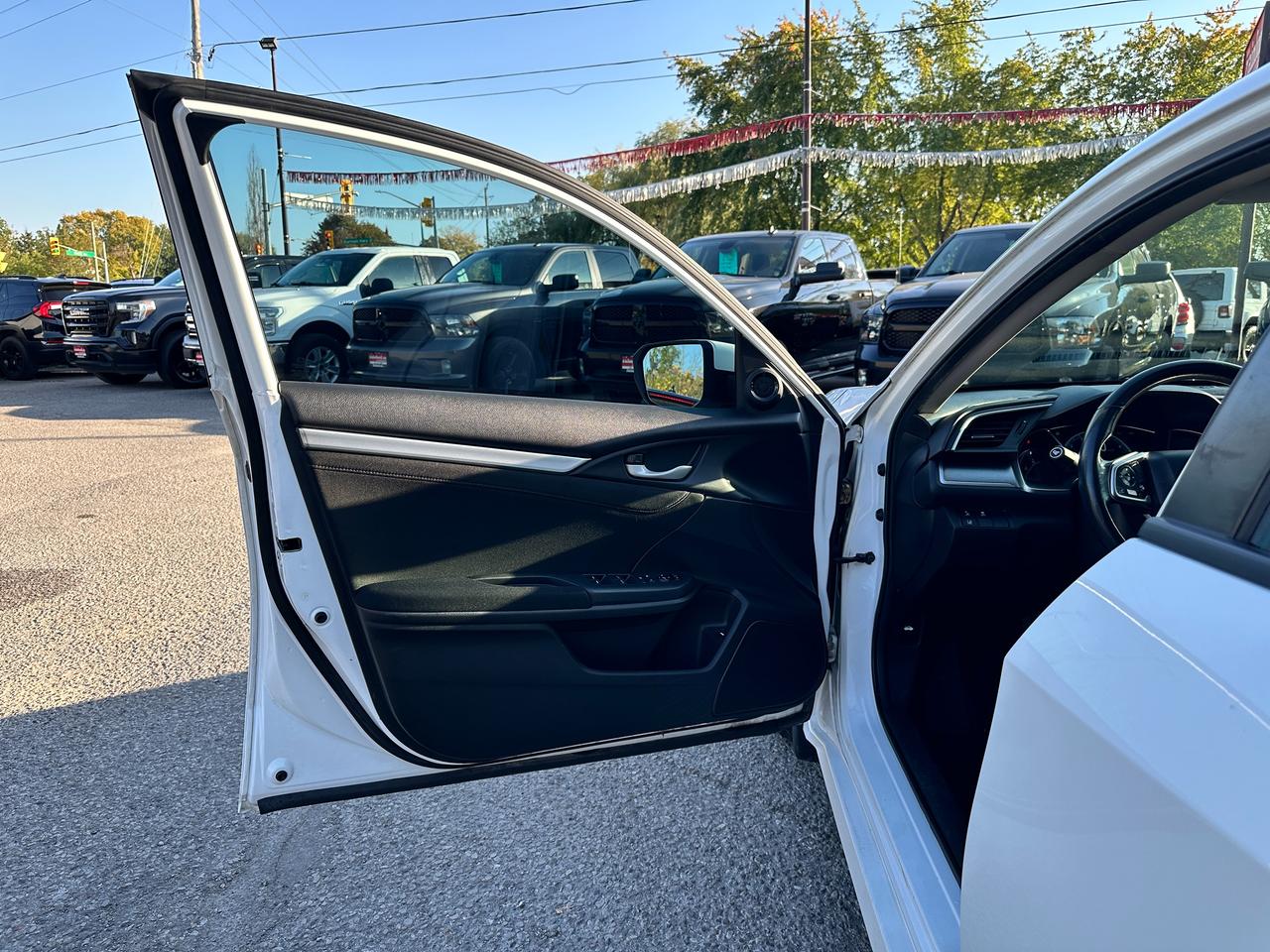 2016 Honda Civic EX-T HondaSensing HTD-Cloth Sunroof RvCam RemStart Photo