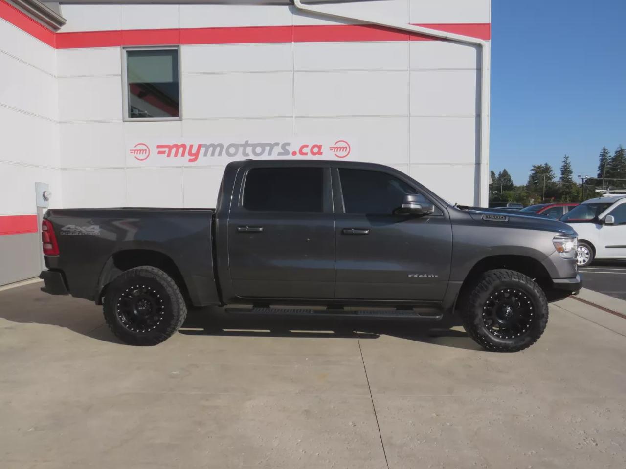 2019 RAM 1500 Big Horn | 4WD | Automatic | Crew Cab | Short Bed | Sport Appearance Package | Off-Road Group | Black Alloy Wheels | All-Terrain Tires | Heated Seats | Heated Steering Wheel | Power Driver Seat | Dual-Zone Climate Control |Touchscreen Display | Apple CarP Photo