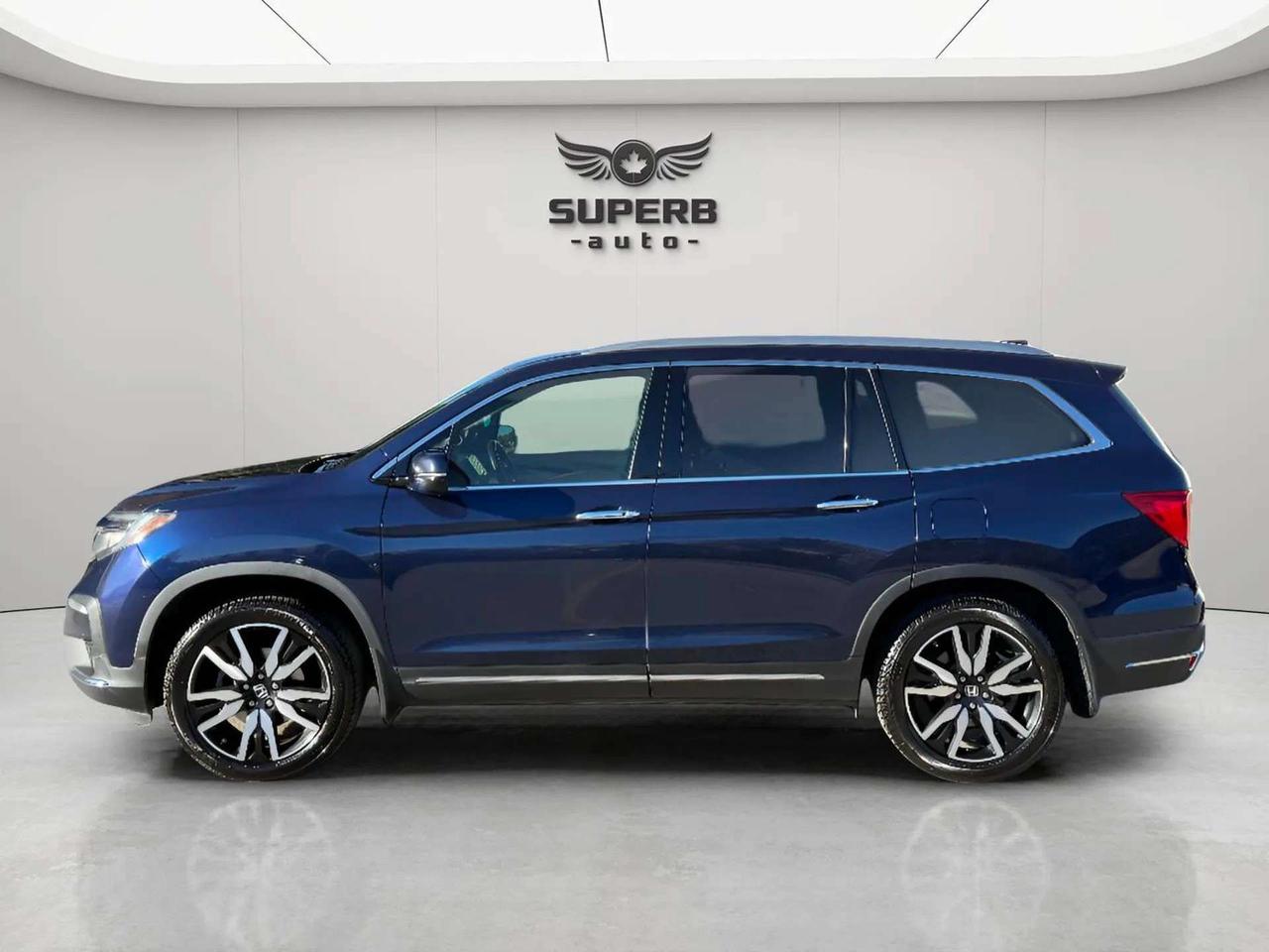 2020 Honda Pilot TOURING   7-PASSENGER   AWD   REAR ENTERTAINMENT SYSTEM Photo