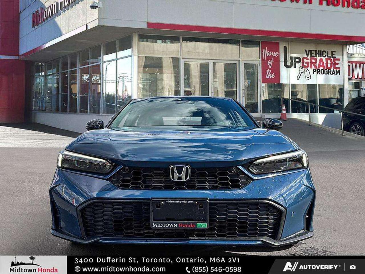 2025 Honda Civic Sport Touring eCVT Sedan Photo2