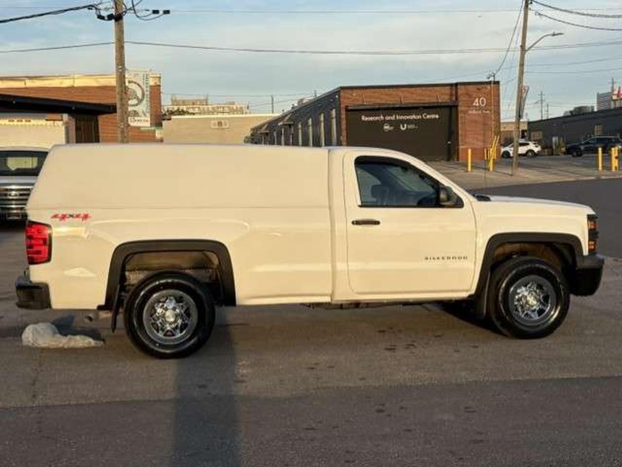 2015 Chevrolet Silverado 1500 4X4 V8 REGULAR CAB LONG BOX-MATCHING CAP-NEW TIRES Photo