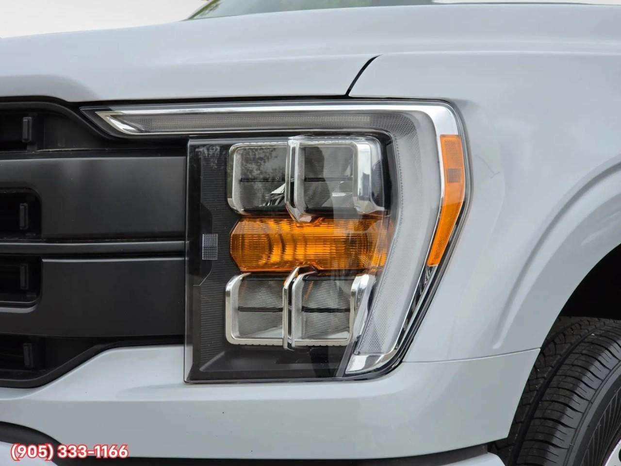 2022 Ford F-150 Lariat Apple CarPlay & Android Auto • Built-In Wi-Fi Hotspot • Lane Assist • Keyless Entry • Backup Camera Photo