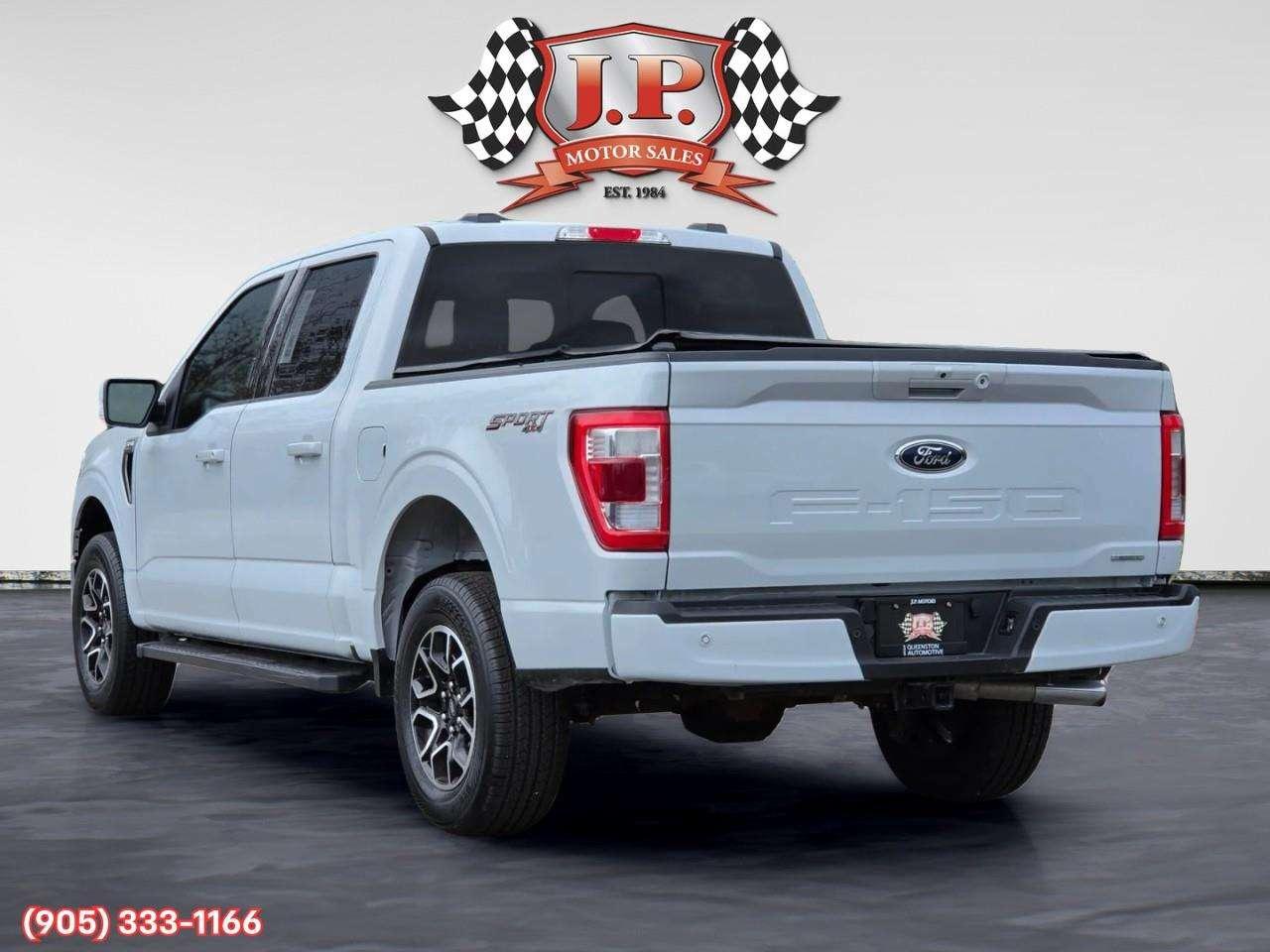 2022 Ford F-150 Lariat Apple CarPlay & Android Auto • Built-In Wi-Fi Hotspot • Lane Assist • Keyless Entry • Backup Camera Photo