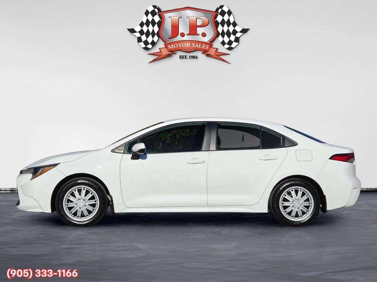 2022 Toyota Corolla LE Apple CarPlay & Android Auto • Lane Assist • Keyless Entry • Backup Camera • Cruise Control Photo
