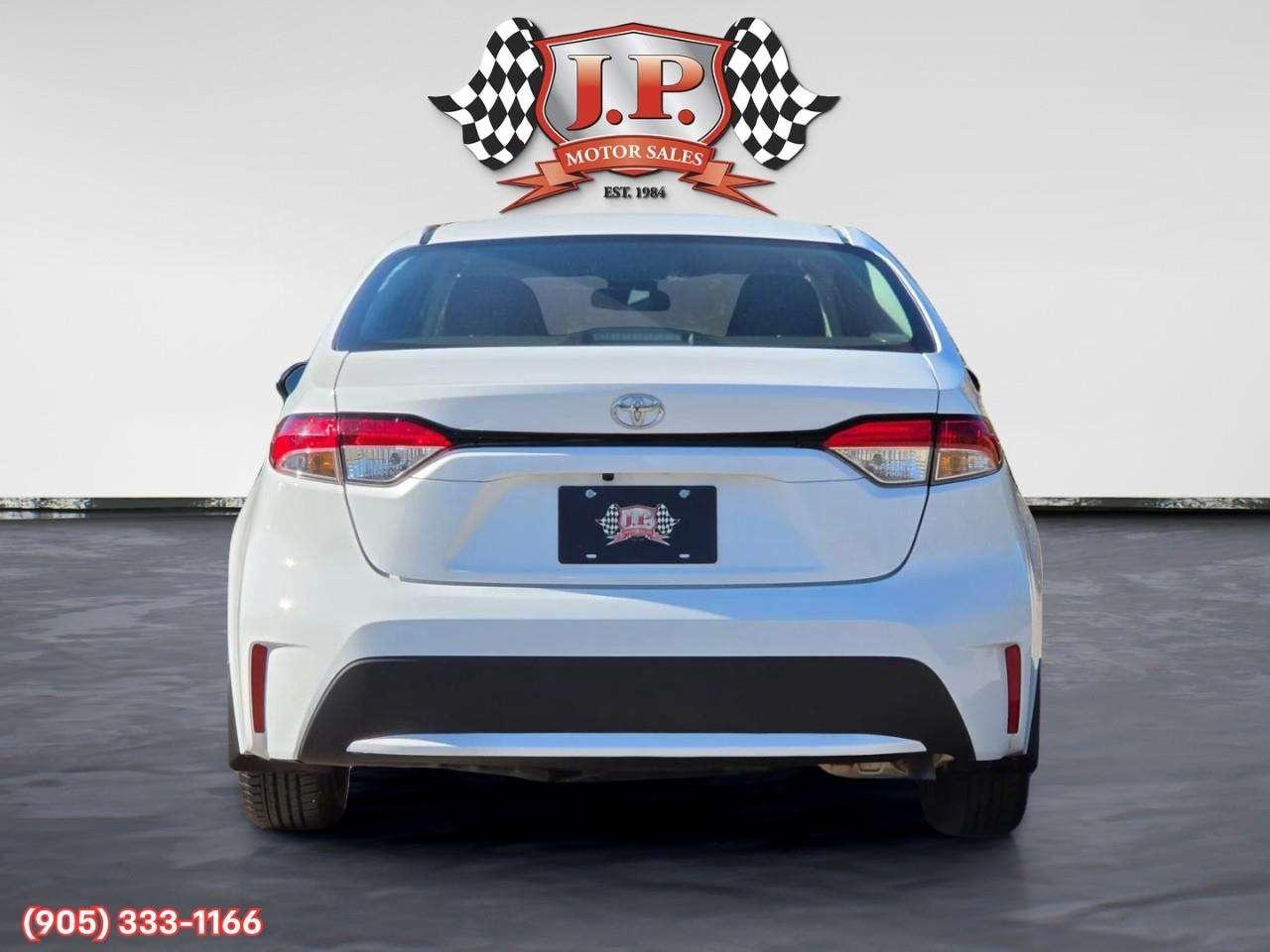 2022 Toyota Corolla LE Apple CarPlay & Android Auto • Lane Assist • Keyless Entry • Backup Camera • Cruise Control Photo