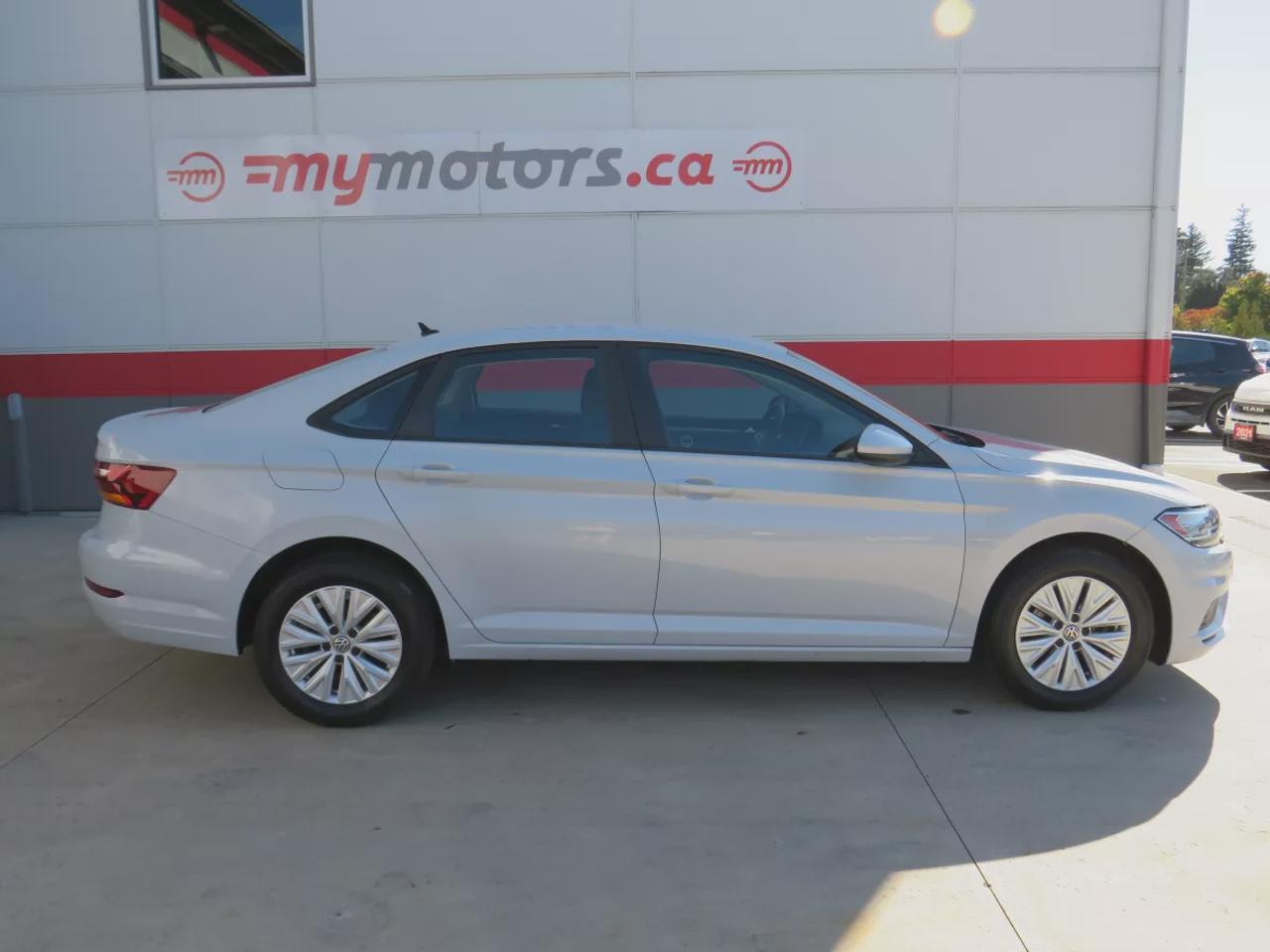 2019 Volkswagen Jetta Comfortline | FWD | Automatic | Low Kms | Alloy Wheels | Heated Seats | Air Conditioning | Touchscreen Display | Apple CarPlay & Android Auto | Bluetooth | Back-Up Camera | Cruise Control | USB Input | Keyless Entry | Heated Power Mirrors Photo