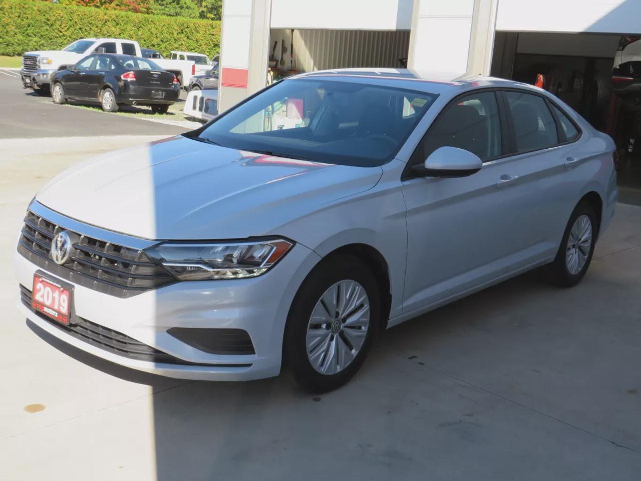 2019 Volkswagen Jetta Comfortline | FWD | Automatic | Low Kms | Alloy Wheels | Heated Seats | Air Conditioning | Touchscreen Display | Apple CarPlay & Android Auto | Bluetooth | Back-Up Camera | Cruise Control | USB Input | Keyless Entry | Heated Power Mirrors Photo