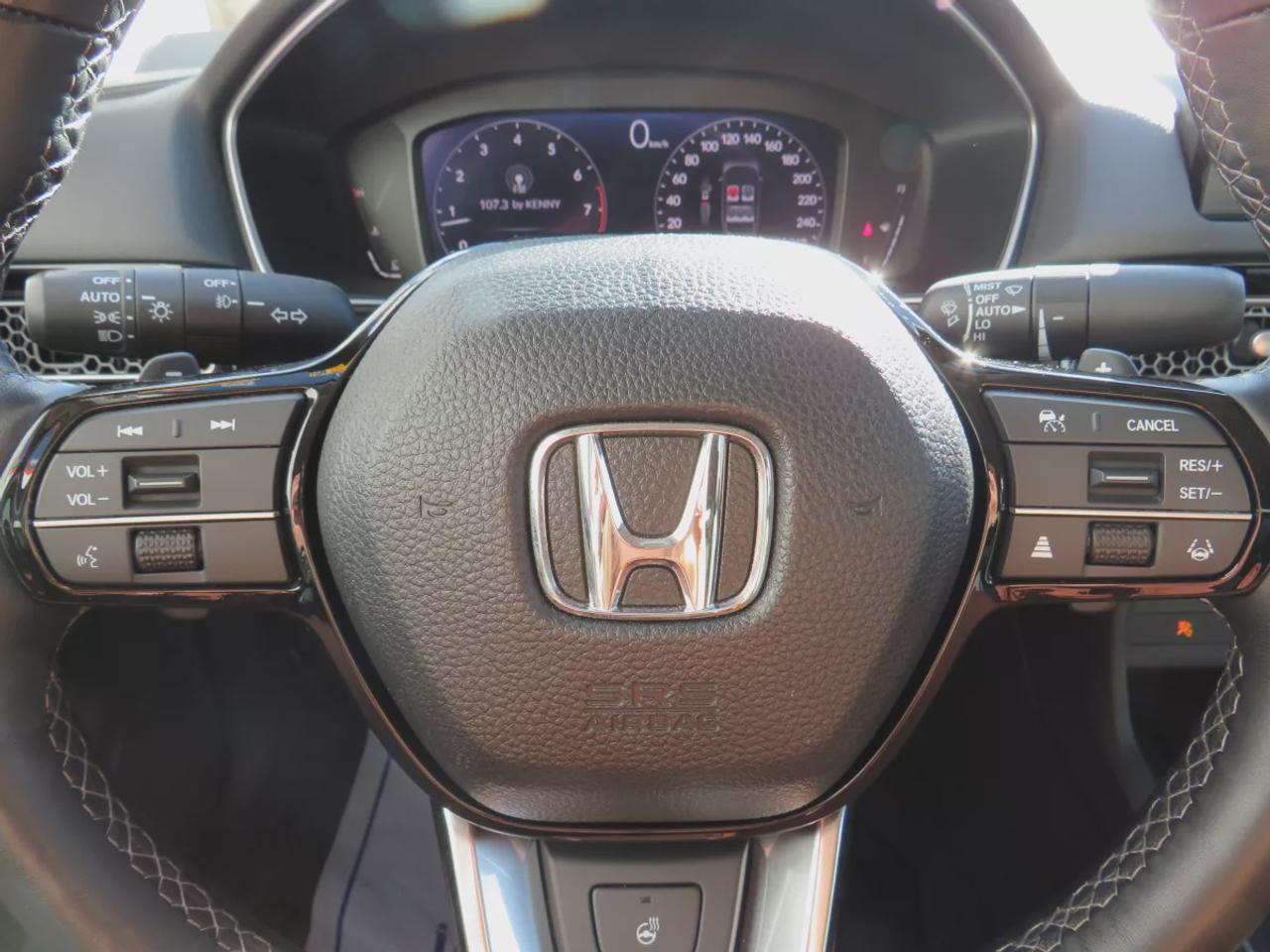 2022 Honda Civic Sedan Touring | LOW KM!! | FWD | Automatic | Alloy Wheels | Leather Seats | Heated Front & Rear Seats | Heated Steering Wheel | Power Driver & Passenger Seats | Climate Control | Sunroof | Touchscreen Display | Wireless Apple CarPlay & Android Auto | Navi Photo