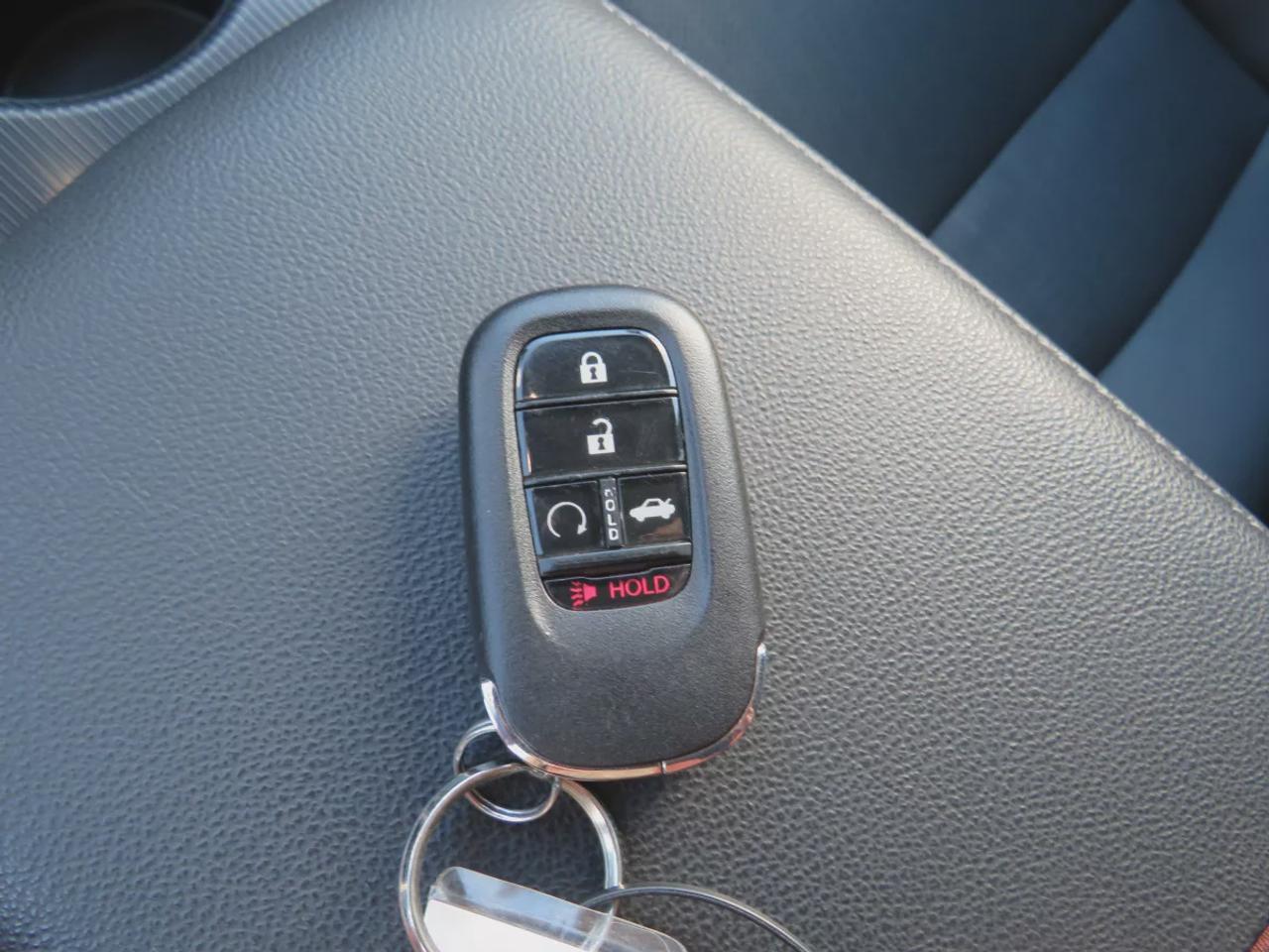 2022 Honda Civic Sedan Touring | LOW KM!! | FWD | Automatic | Alloy Wheels | Leather Seats | Heated Front & Rear Seats | Heated Steering Wheel | Power Driver & Passenger Seats | Climate Control | Sunroof | Touchscreen Display | Wireless Apple CarPlay & Android Auto | Navi Photo